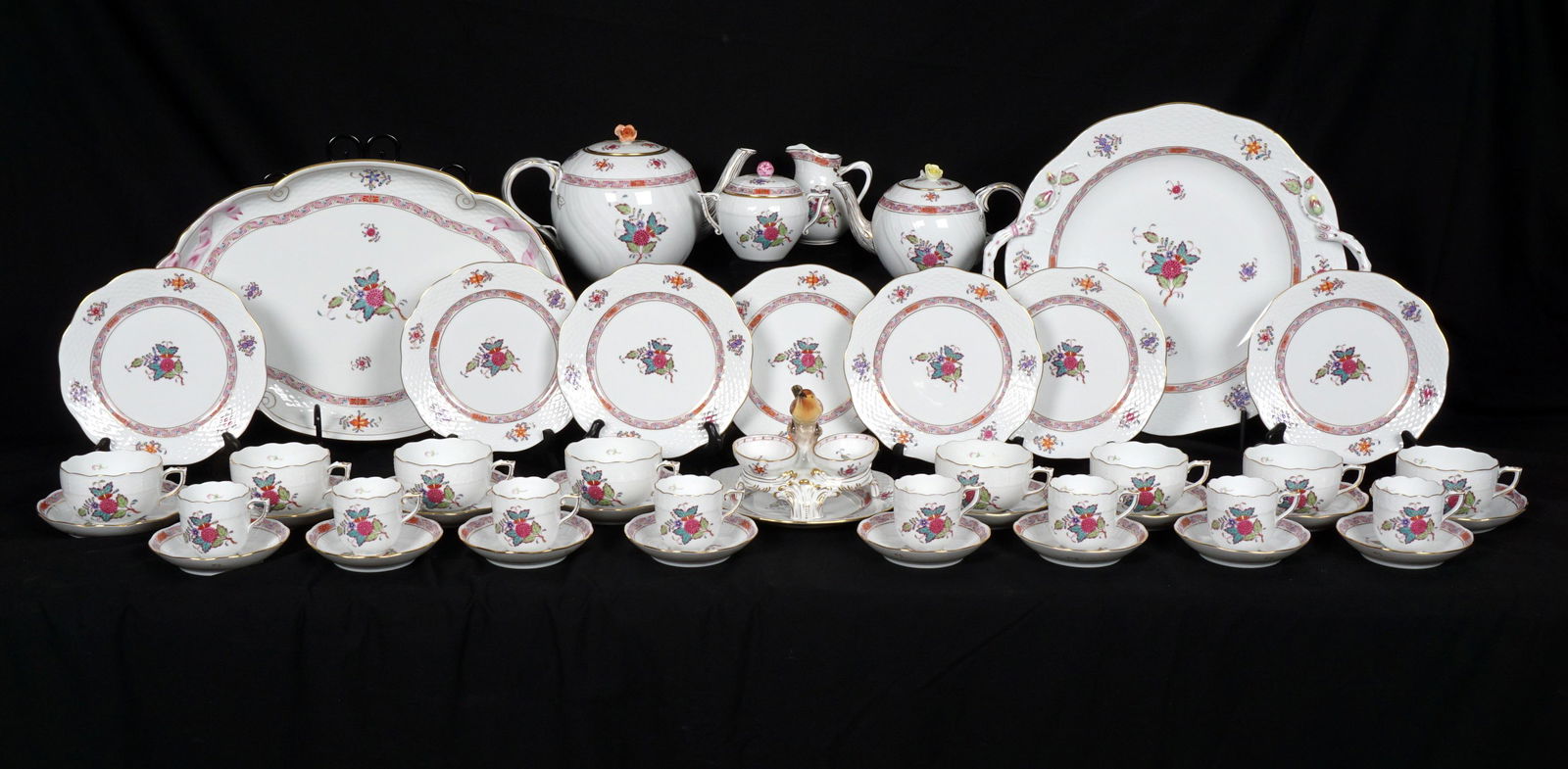 47 Pc Herend Chinese Bouquet Multicolor Tableware: 47 pieces in the Chinese Bouquet Multicolor pattern by Herend to include teapot with flower finial (6.25" h.), smaller teapot with flower finial (5"), covered sugar (3.75"), open creamer (4"), tray wi