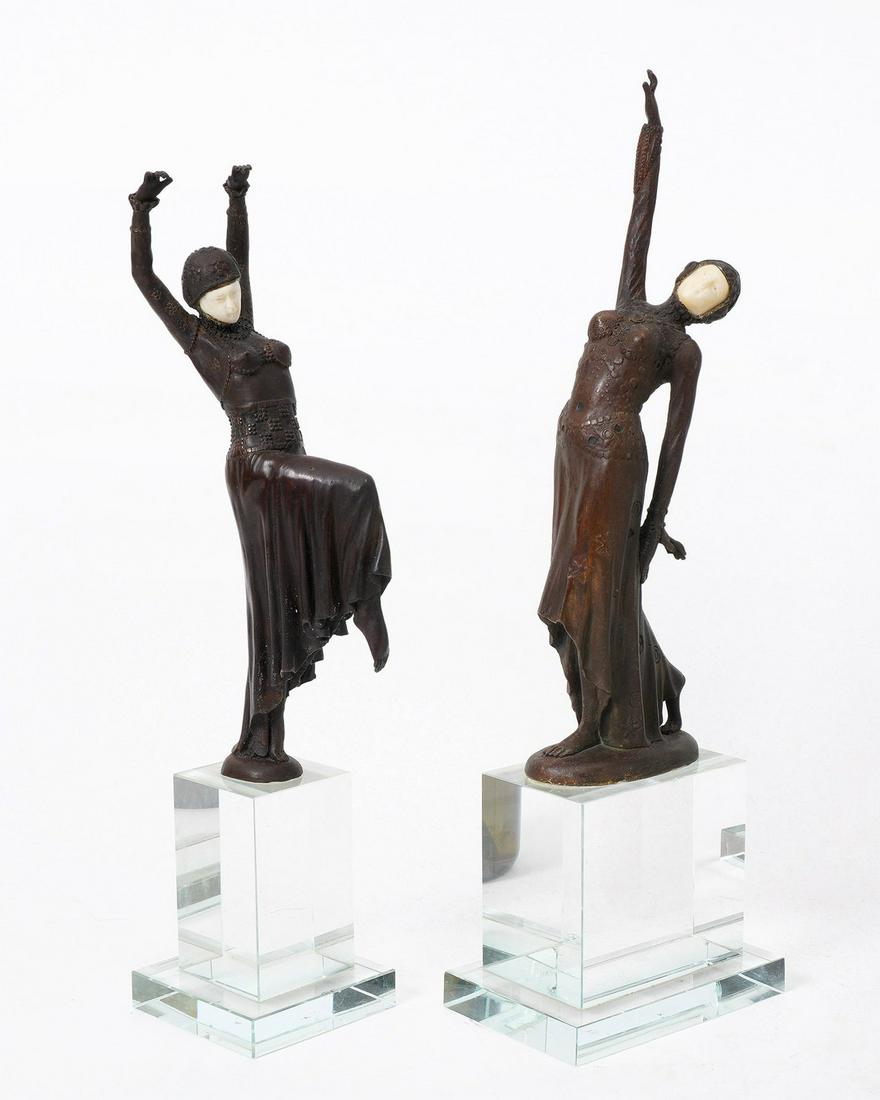 Two Chiparus Style Bronze Deco Dancers: Two art deco style bronze dancers in the style of Chiparus, composite faces, affixed to acrylic bases, taller measures 14" h. x 4.5" x 3". From the estate of a prominent lawyer from New Rochelle, NY.