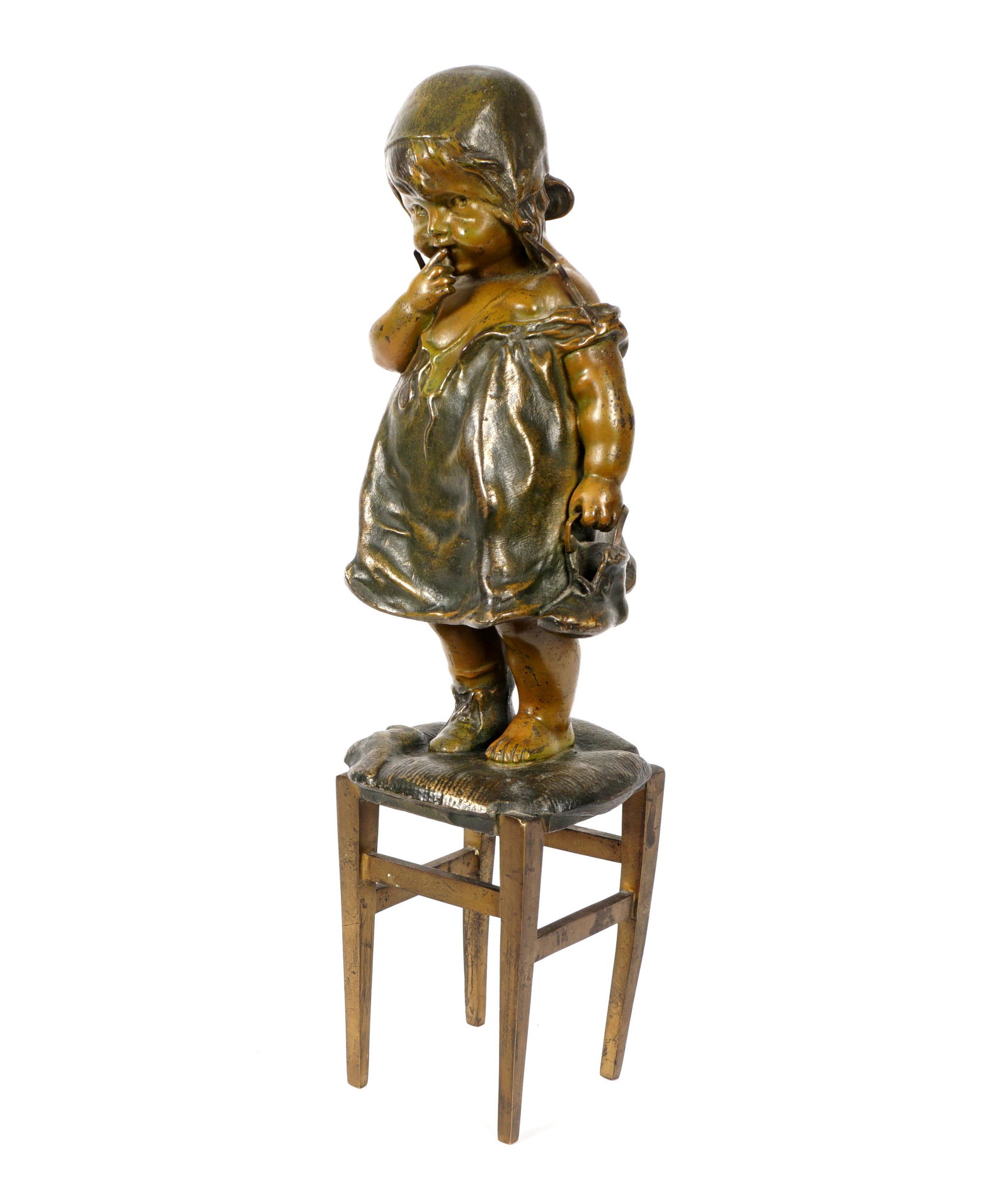 after Juan Clara Girl Standing on a Stool Bronze: after CLARA, Juan, (Spanish, 1875-1958)" Figure of a young girl standing on stool, unsigned, measures 13.25" h. x 3.5" x 3.5". Condition: Uneven patina. From the estate of a prominent lawyer from New