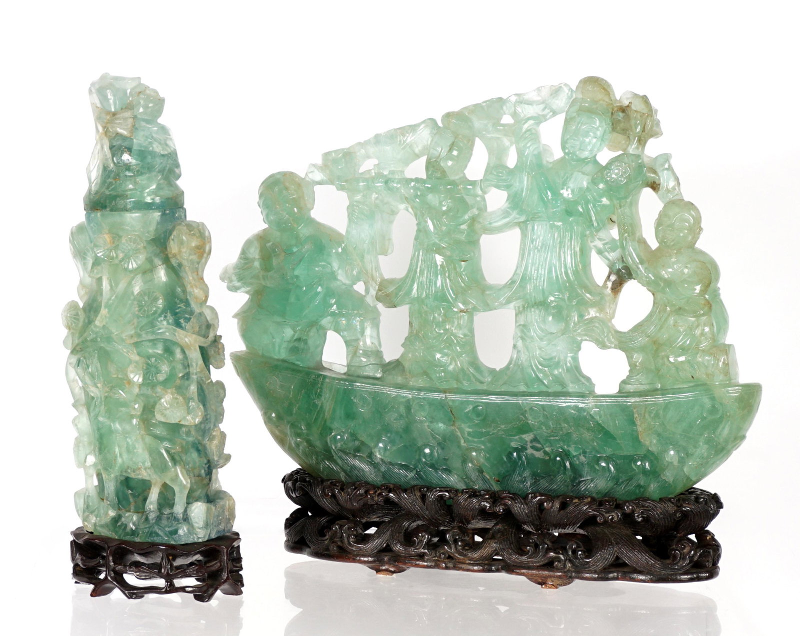 Chinese Green Quartz Figures and a Covered Vase: Two pieces total carved green quartz or similar stone, to include 1) Four figures in a boat, affixed to carved stone base, overall 12.5" h. x 14" x 3". 2) Covered jar with animals and trees, 11" h. x