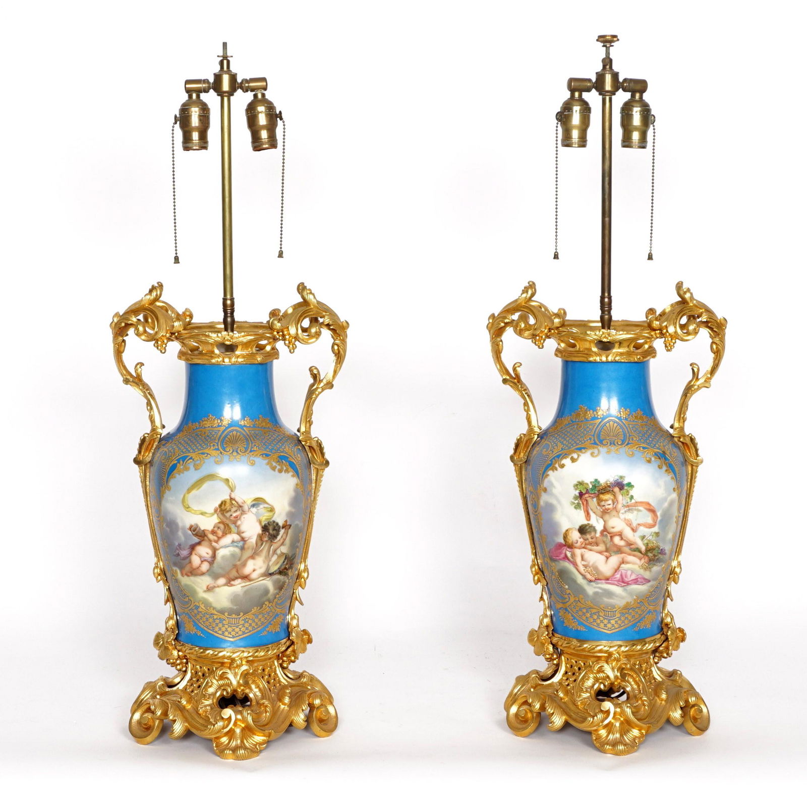 Pr Jacob Petit Gilt Bronze Mounted Porcelain Lamps: Pair turquoise ground porcelain vases with cherubs,birds, and flowers in reserves, marked with JP Jacob Petit blue marks on bases. Gilt bronze foliate scroll handle, rim, and base mounts, double socke