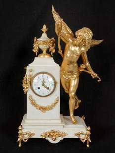 French Gilt Bronze Cherub and Marble Mantle Clock: Full figure gilt bronze Cupid with bow and arrows, marble urn finial with gilt bronze accents, marble case and base, all on four gilt bronze torch feet. Porcelain dial with Arabic numerals and floral