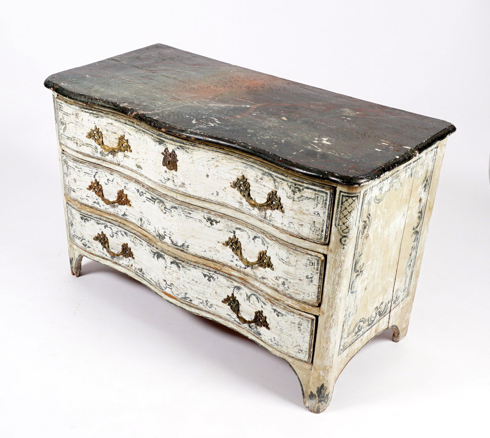 French 18th C. Painted Serpentine Chest of Drawers: 18th Century paint decorated serpentine top over conforming three drawer painted case, gilt metal pulls, shaped skirt, all on four feet. 32" h. x 51.25" x 24.5". From the estate of Hazel Hanlon, lifet