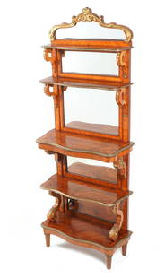 French Satinwood Etagere with Ormolu Mounts: Satinwood veneer all over, shaped crest with applied ormolu foliate scroll decoration over five graduated serpentine shelves with mirror backs, scroll supports. Applied ormolu trim and decoration,