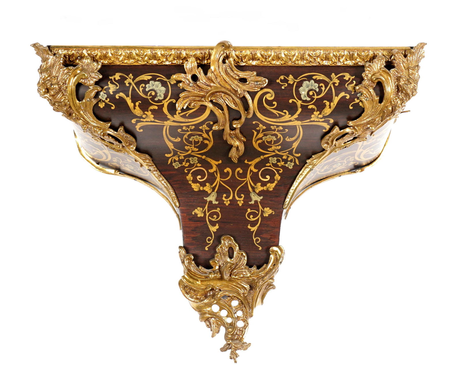 French Mahogany Ormolu Decorated Wall Bracket: Mahogany wall shelf, painted faux boulle foliate scroll designs, applied ormolu decoration, 15" h. x 20.25" x 10.25" excluding mounting brackets. From the estate of a prominent lawyer from New Rochell