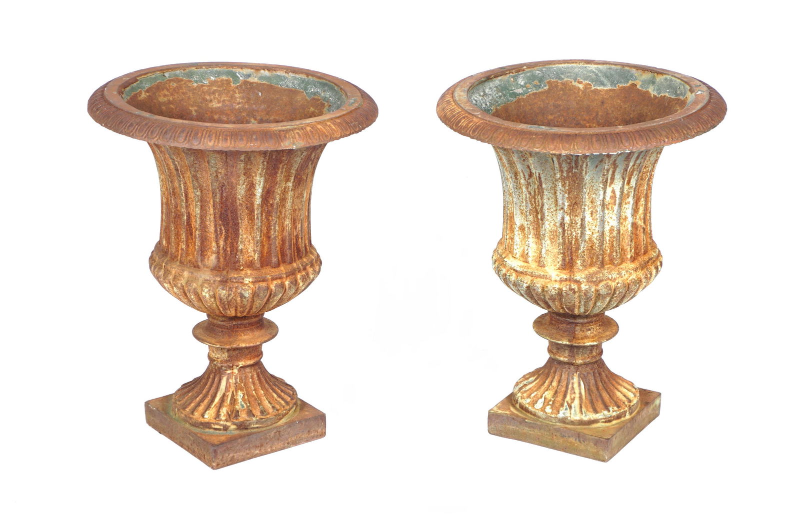 Pair Cast Iron Garden Urns: Pair classical cast iron garden urns, flared rims, fluted body, overall 19" h. x 15" dia. Condition: Obvious signs of weathering. From the estate of a prominent lawyer from New Rochelle, NY.