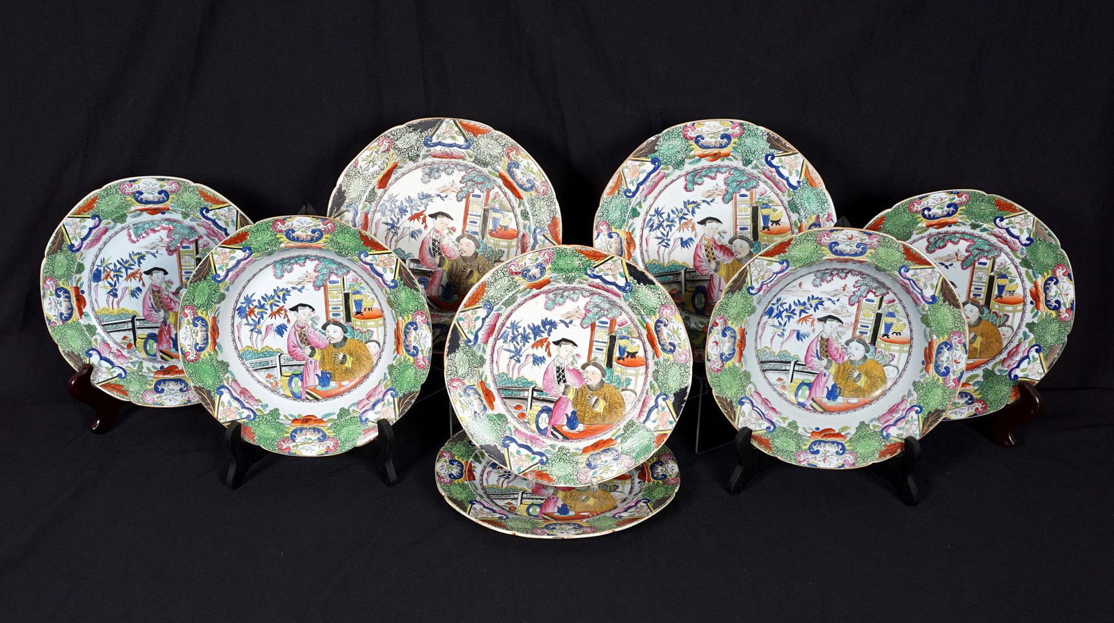 Eight Mason's Ironstone Green Mandarin Plates & Bowls: Eight pieces total in the green Mandarin pattern by Mason's Ironstone, to include six plates 9.5" dia, two bowls 9.75" dia. Condition: All with wear to decoration, one plate with staple and glue repai