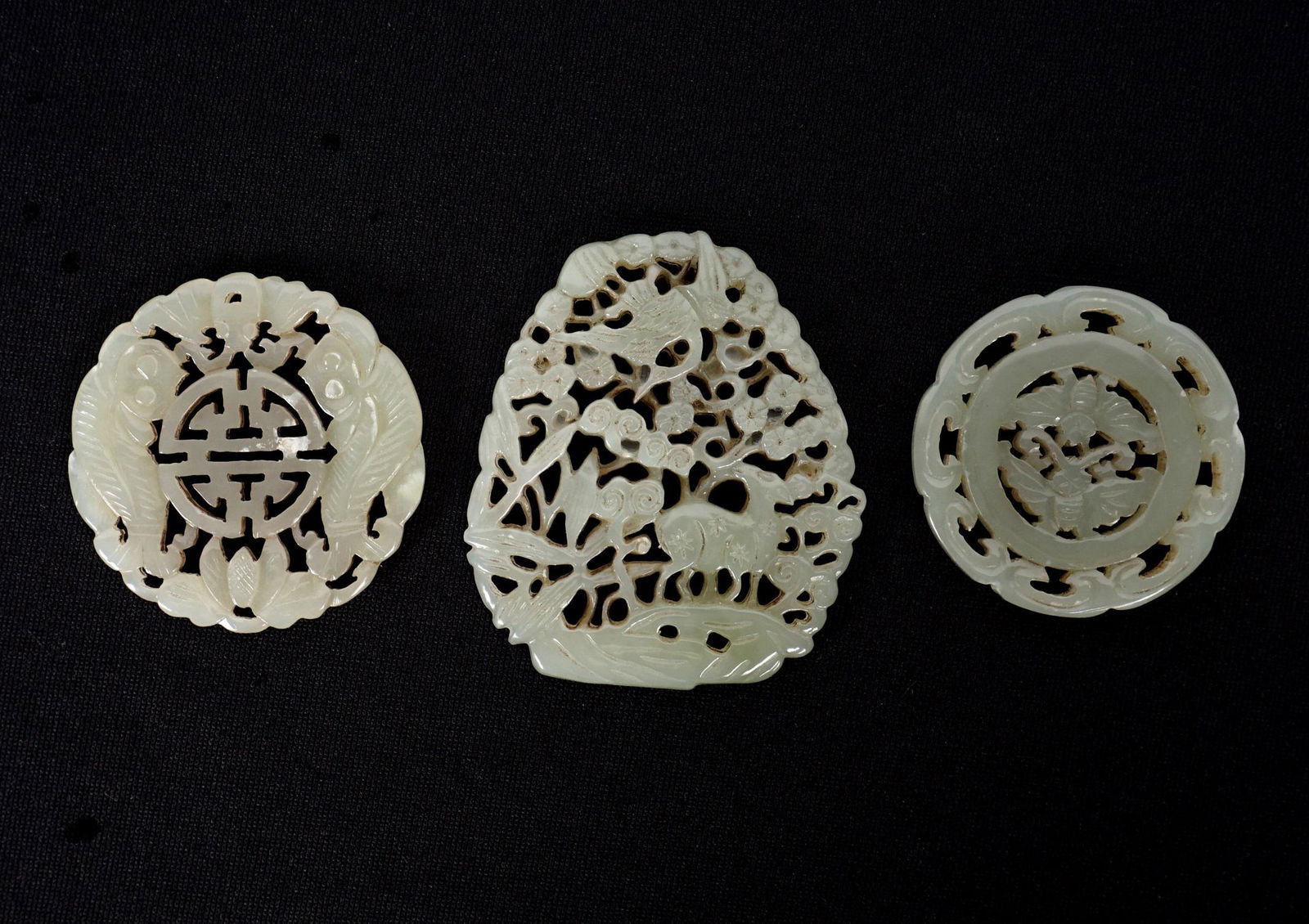 Three Chinese Reticulated Jade Medallions (1 of 4)