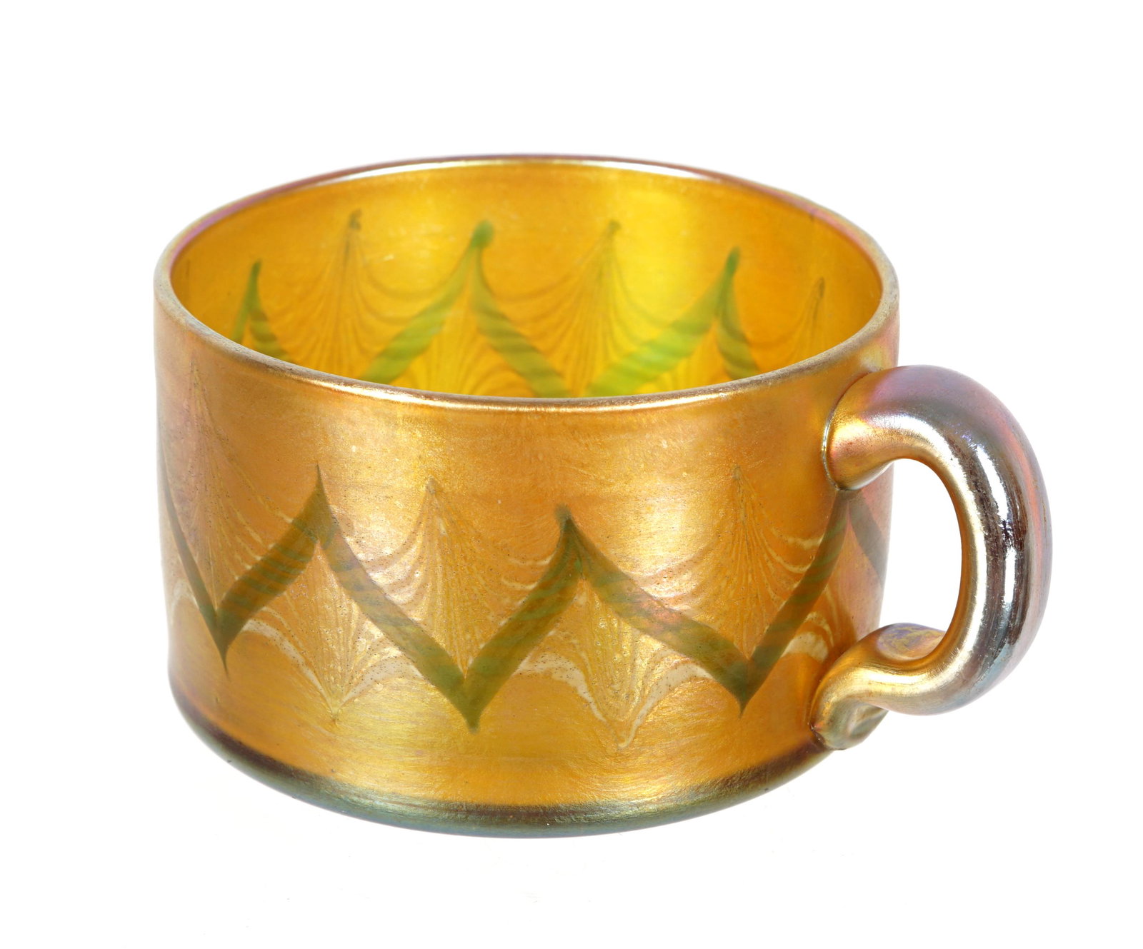 Tiffany Gold Favrile Iridescent Handled Cup V705: Handled low teacup, gold iridescent Favrile glass with pulled feather garland, well marked L. C. Tiffany. Favrile, V705. Overall 1 7/8" h. x 4".