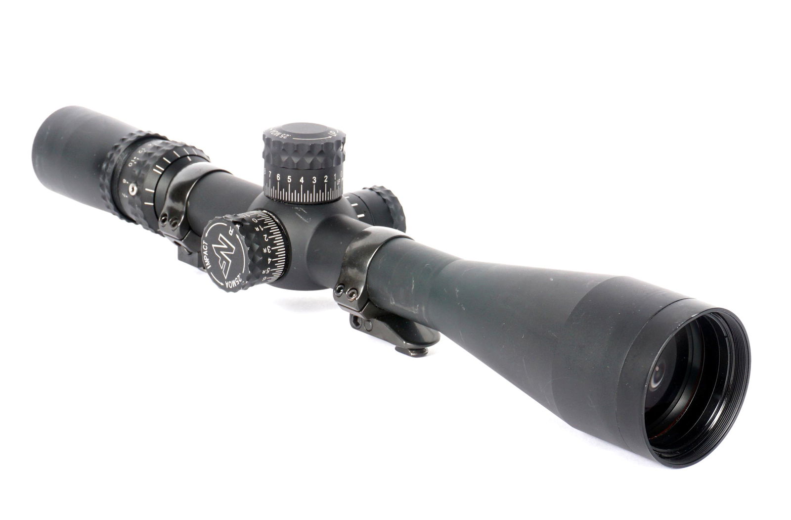 Nightforce NXS 5.5- 22 x 50 Rifle Scope: Nightforce NXS 5.5-22x50 scope, matte black finish, optics appear to be excellent, sold with rubber lens covers and tube mounts. Overall 15.25". Condition: Mounting scratches to tube.