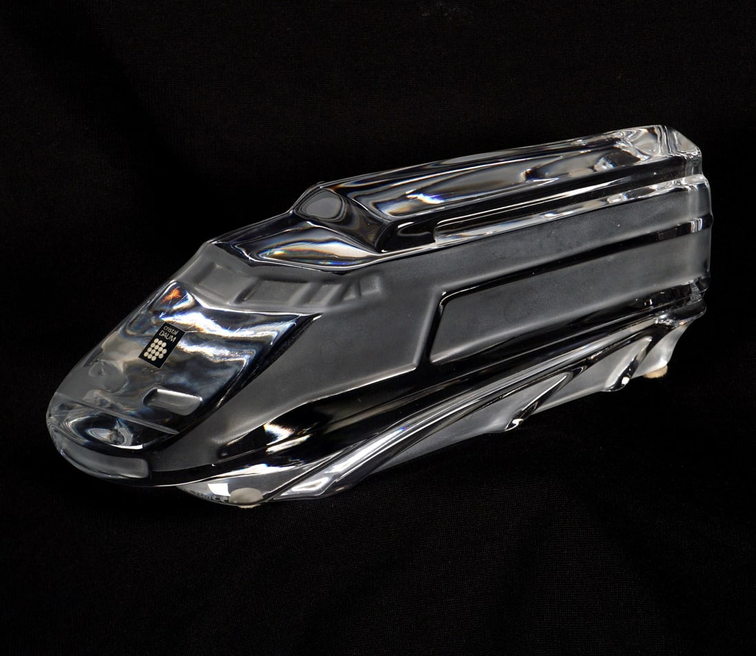 Daum Crystal TGV Train Sculpture: Daum crystal relief model of a TGV train, signed Daum France, overall 3.75" h. x 9.75" x 2". No condition issues noted.