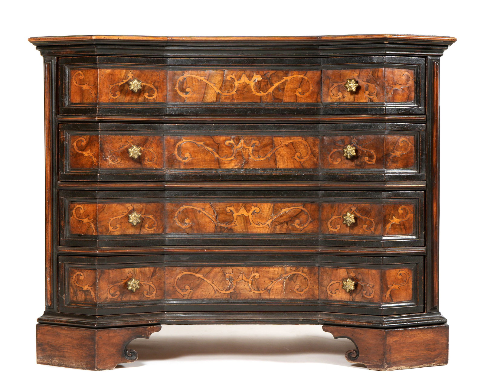 18th/19th Century Italian Inlaid Chest of Drawers: Shaped top over conforming case, four drawers with inlaid marquetry foliate scroll accents. Scroll carved feet, overall 37.75" h. x 49" x 27.5". Condition: Scratches, other wear consistent with age an