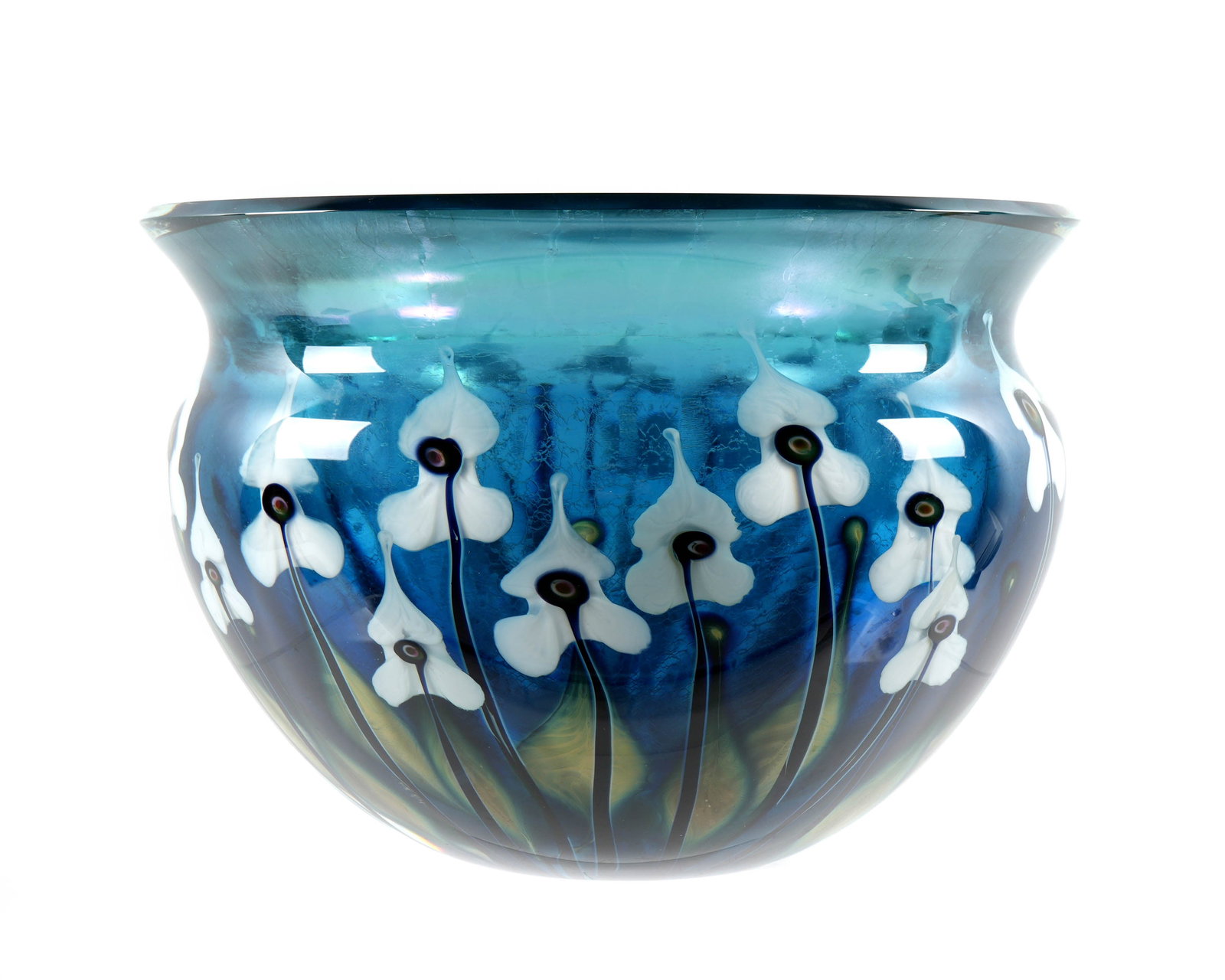 John Lotton Iridescent Turquoise Art Glass Bowl: Large iridescent turquoise blue art glass bowl with flared rim, trillium type flowers raising from base, signed and dated 2001 near base. Overall 7.75" h. x 11" dia. Condition: Minor scratches near ba