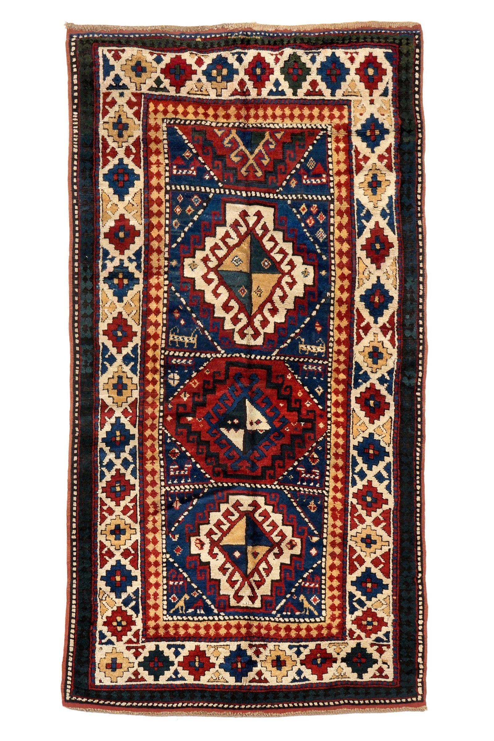 Antique 19th C. Thick Heavy Caucasian Kazak Rug / Carpet: Three traditional border bands, blue center field with three full medallions, one half medallion, overall 3' 8" x 6' 11". Please see photos for condition.