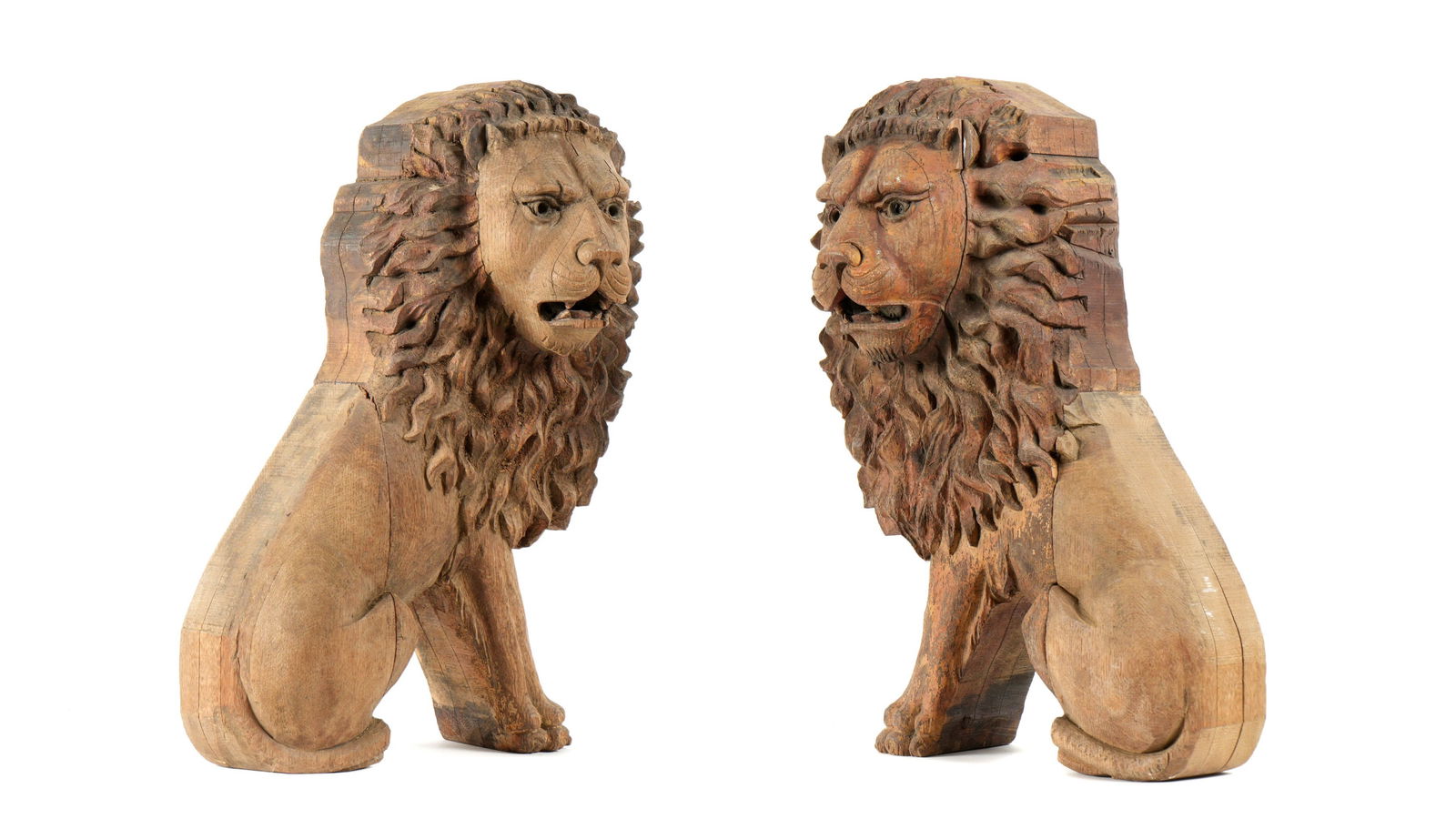 Pair 18th / 19th Century Carved Wood Lions: Pair carved wood lions with traces of paint and gilt remaining, overall 21.5" h. x 13.5" x 8.5". Condition: Age splits, cracks, chips, and losses.