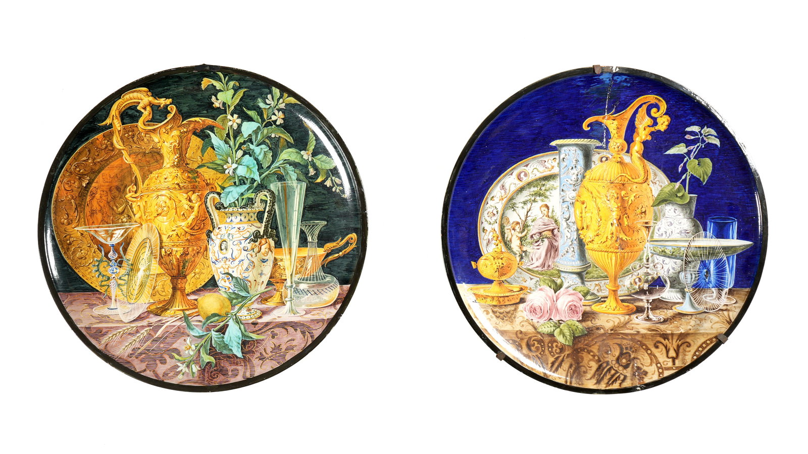 Two Large Italian Ginori Majolica Chargers: Two pieces total, each well marked with Ginori marks and numbers. Both with classical style life motifs with ewers, plates, vases, and other table items. Overall 2" h. x 24.75" dia. Condition: Both wi