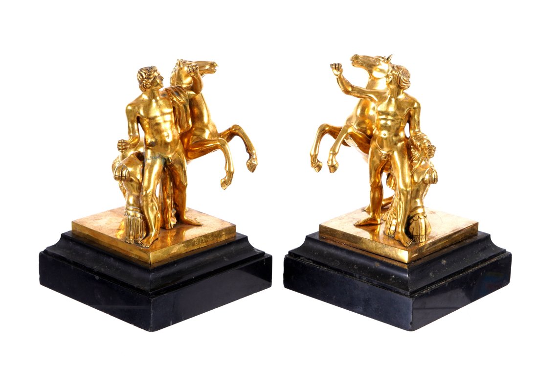 Pair Gilt Bronze Figural Soldier and Horse Bookends: Pair of gilt bronze and slate bookends. Figure nude Roman? soldier with armor next to him, and rearing horse. Slate bases marked J.B. (Jennings Bros?). Overall 9.5" h. x 6.5" x 7". Condition: Spotting