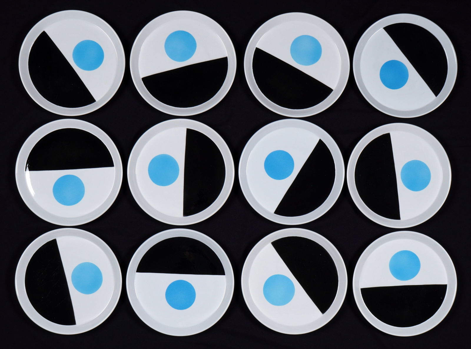 Twelve Gio Ponti Fantasia Italiana Plates: Set of 12 Mid Century plates designed by Gio Ponti for Ceramica Franco Pozzi, all plates with matching design. Marking on back vary between two different marks for Gallarate and Collizone. Overall 10.