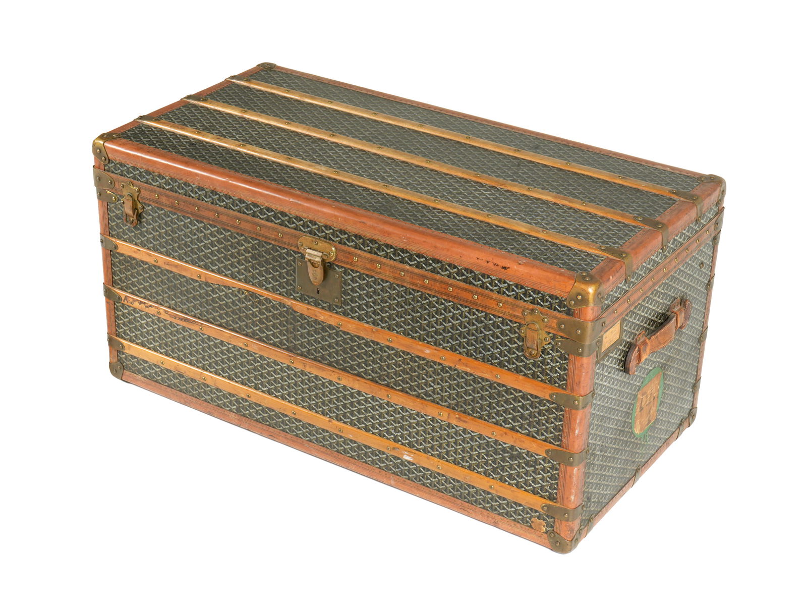Large Malles Goyard French Steamer Trunk: Vintage flat top steamer trunk, chevron canvas and wood slats, top opens to quilted open interior, Malles Goyard tag affixed to exterior side. Leather carrying straps. Overall 22.5" h. x 43.5" x 22.5"