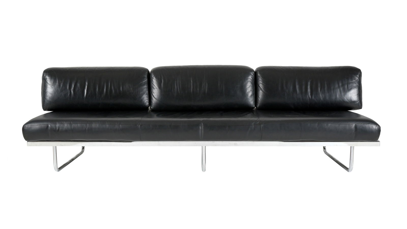Cassina LC5 Chrome and Black Leather Sofa: Le Corbusier for Cassina daybed / sofa, chrome metal tube construction, marked under top rail tube, cloth strap seat supports. Black leather upholstery, overall 30" h. x 97" x 29.5" with cushions, sea