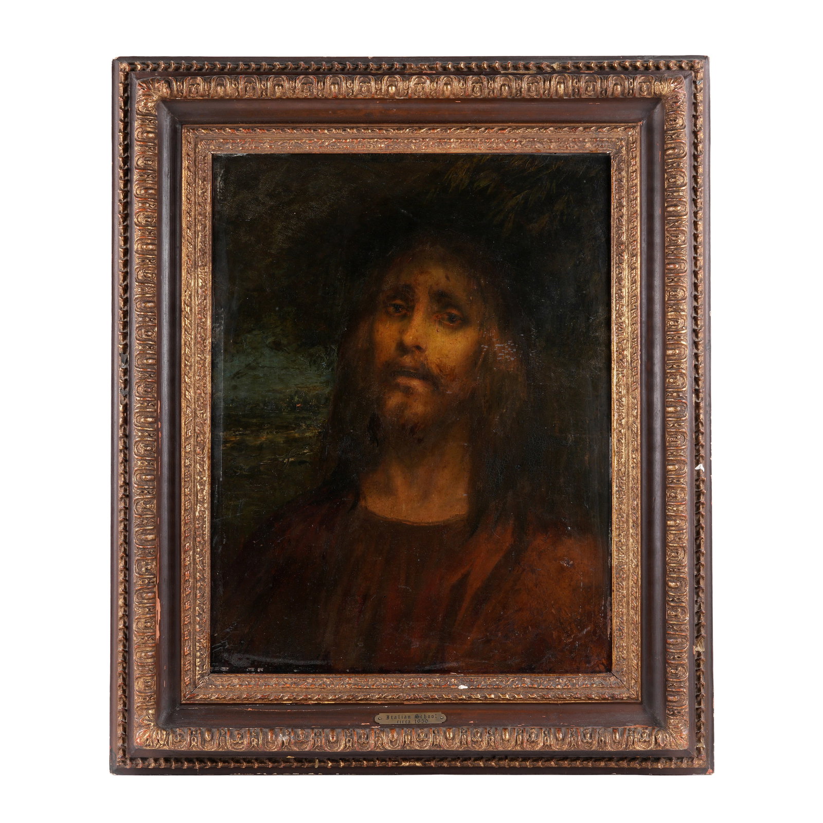 17th C. Italian Portrait of Jesus Ex-Christies: Circa 1650, Italian School portrait bust of Jesus with sea landscape behind, Oil/Wood Panel, no visible signature, Christie's label verso, 22.5" x 17.5", framed 31" x 26". Condition: Scattered inpaint