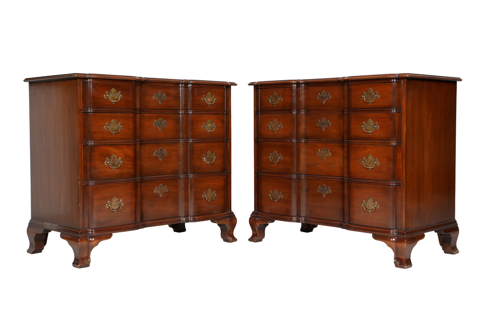 Pair of Kindel Mahogany Blockfront Commodes: Matched pair blockfront four drawer commodes from the Kent Collection. Carved bracket front feet, well marked inside top drawer. Overall 37.5" h. x 42" x 22". Condition: Minor scratches to top, other