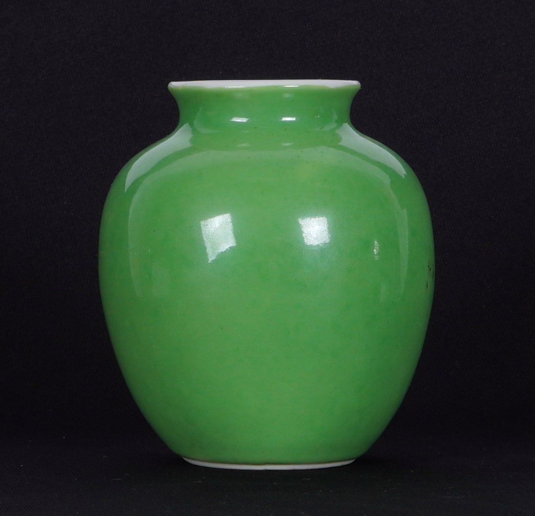 Chinese Apple / Lime Green Porcelain Squat Vase: Squat ovoid form porcelain vase, apple or lime green exterior glaze, white interior. Bears a six character Chenghua mark under foot, overall 3.5" h. x 3". Condition: Blemish to glaze on side.