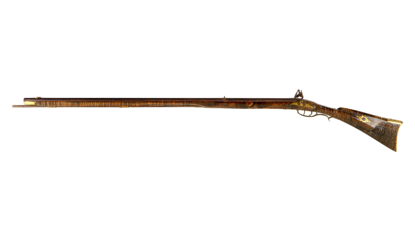 Ornate Carved Stock and Inlaid Kentucky Rifle: Unsigned 42" octagonal rifled barrel, approx. .44 caliber. Full stock with relief and incised carving, the initial "P", Germanic brass patchbox, inlaid brass decoration and Federal eagle at top of wri