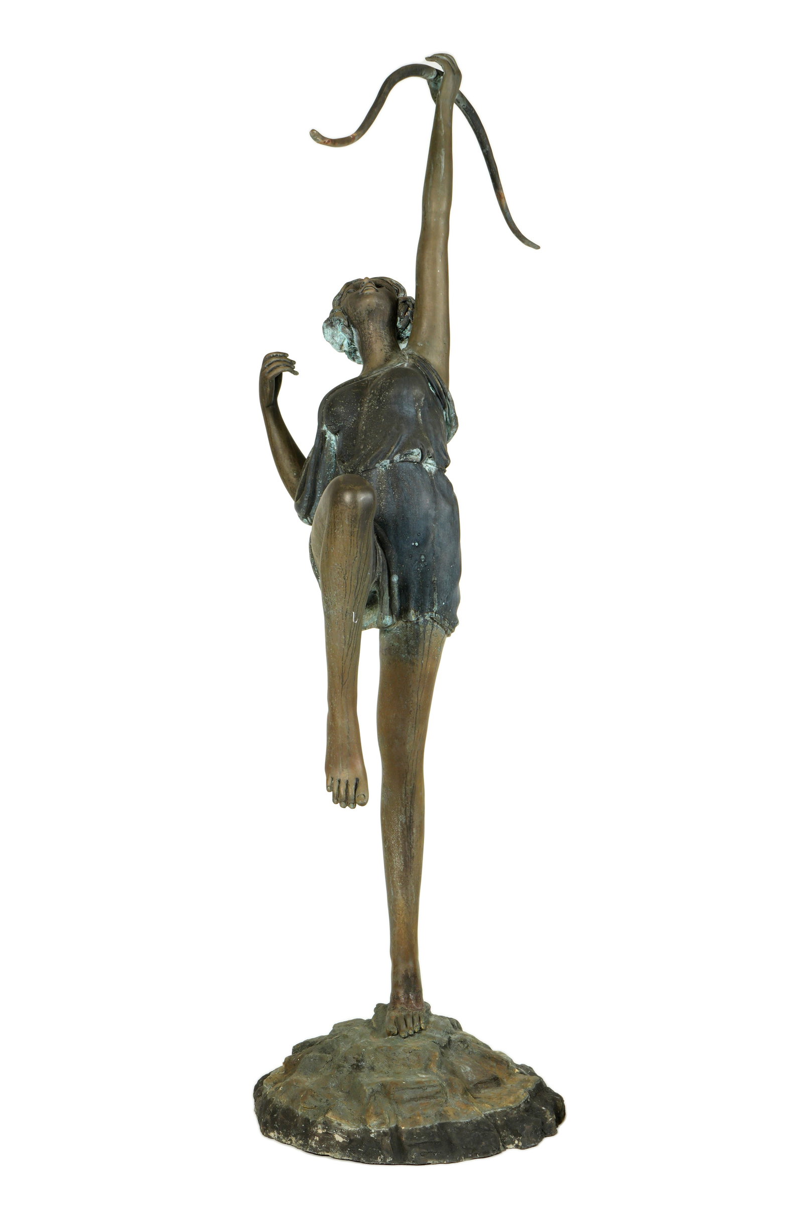 Large Diana the Huntress Bronze Garden Fountain: Art nouveau style life size bronze garden statue depiction of Diana the Huntress with bow held above head, fountain top at joint of hand and bow, no visible markings. Overall approx. 83.5" h. x 38.5"