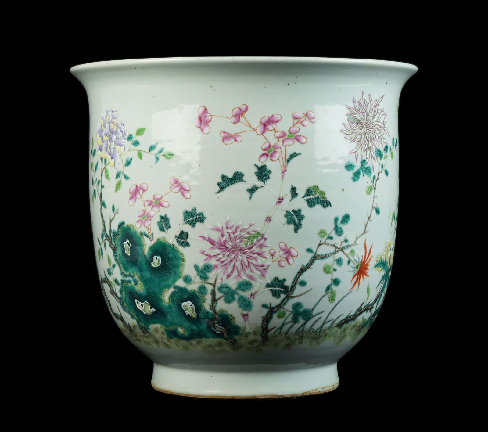 Large Chinese Famille Rose Porcelain Planter: Large floor planter, famille rose decorated with floral motifs, unsigned, drilled center. Overall 14.25" h. x 15.25" top dia.