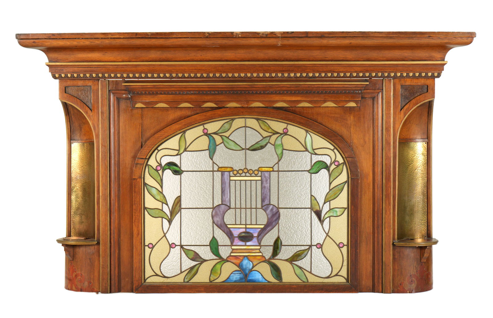 Large Stained Glass Architectural Element: Molded pediment over arched lyre and foliate motifs leaded and stained glass window. Canted corners with applied copper sheets. We believe this was the top facade to an organ.. Overall 47.5" h. x 77"