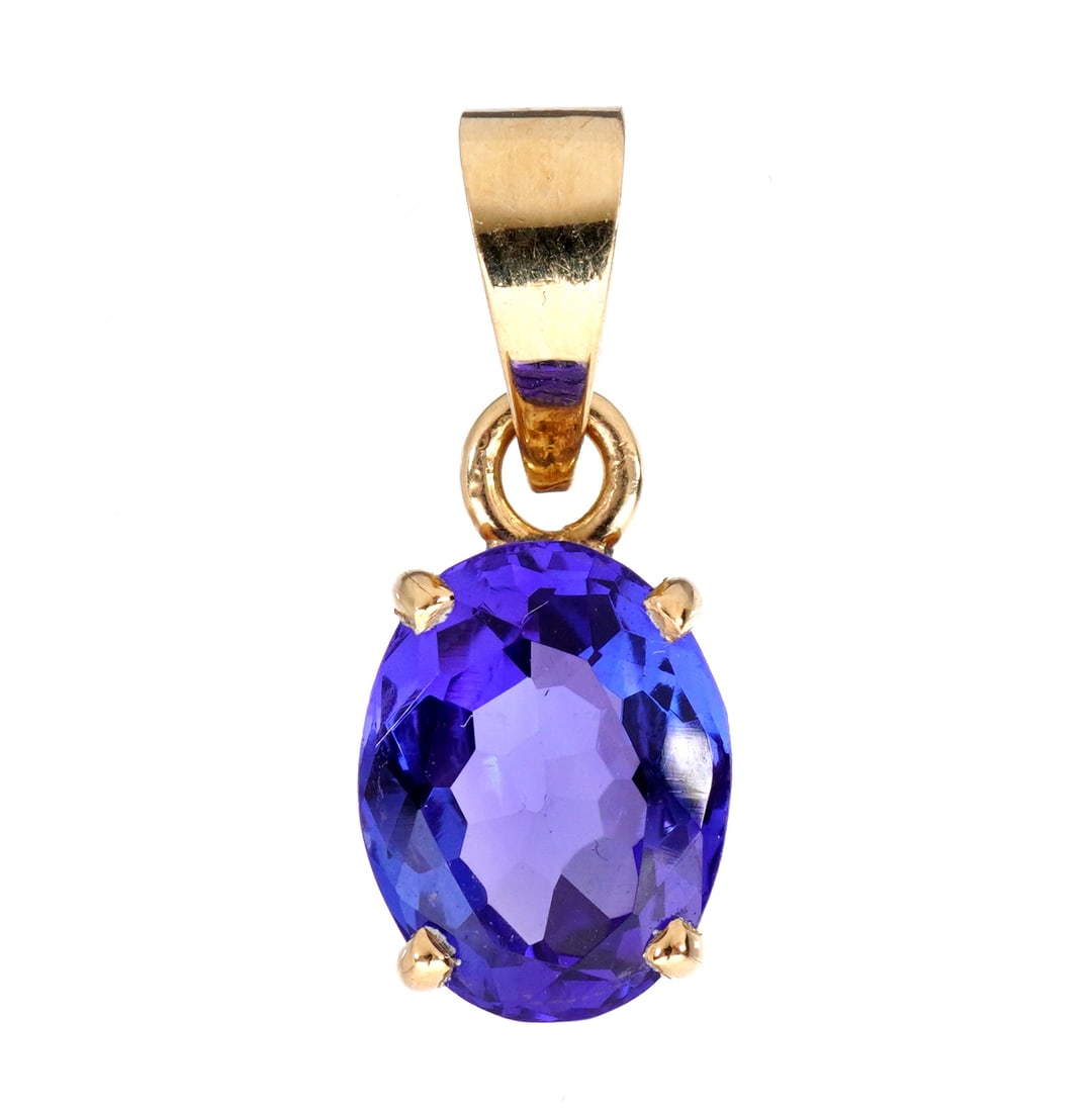 14k Gold Aquamarine Pendant Enhancer: 14k yellow gold clip pendant enhancer, prong set pear shaped aquamarine, 15.5mm x 7.8mm x 6.1mm, approx. 3.85cts, medium blue color, moderate saturation, and intensity, very slight inclusions under 10