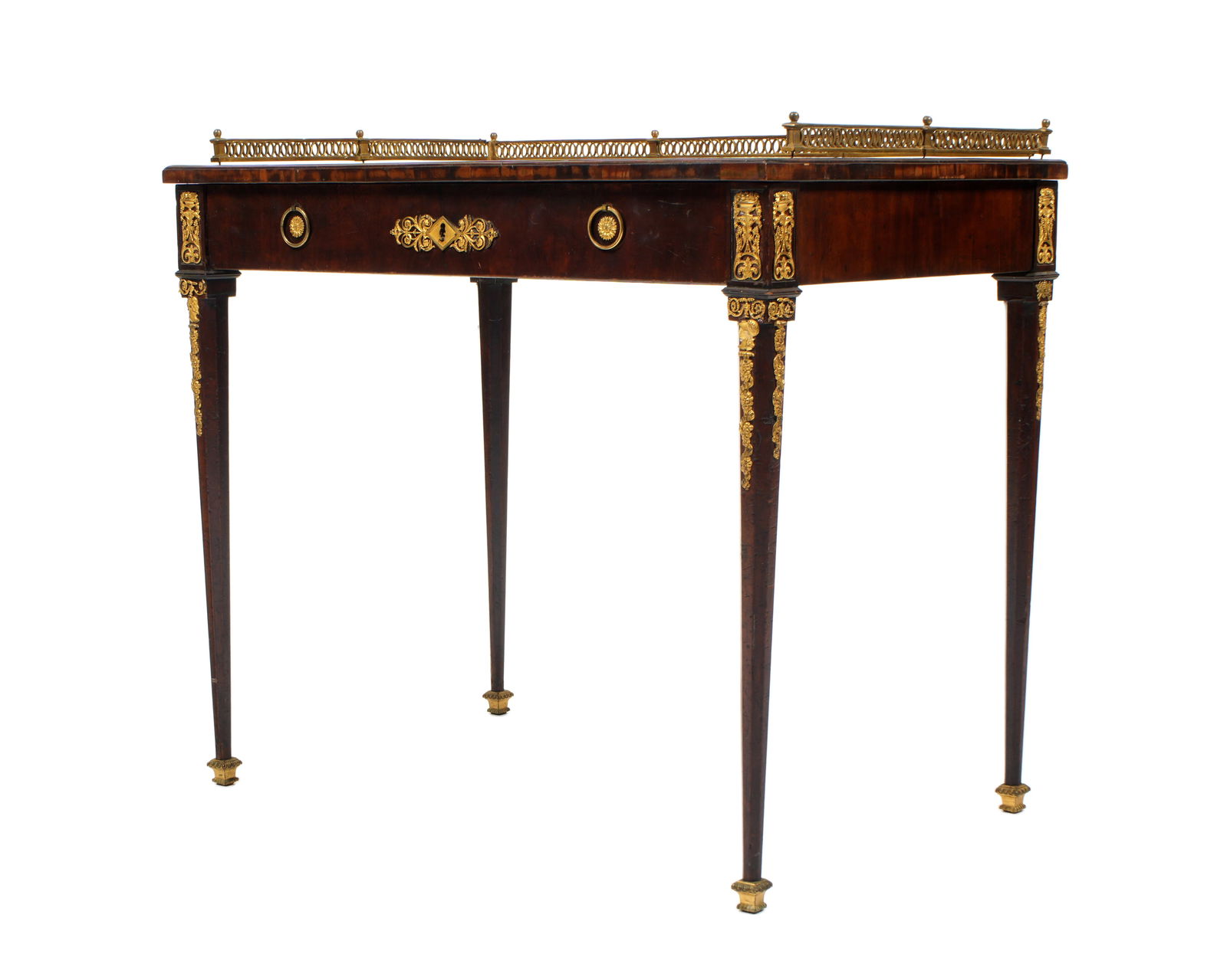 French Louis XVI Style Ormolu Mounted Writing Desk: Mahogany top with brass gallery, single drawer, ormolu mounts and accents, tapered legs ending in bronze feet. Overall 33.5" h. x 35.75" x 23.75". Condition: Scratches to desk, veneer loss, bends to g