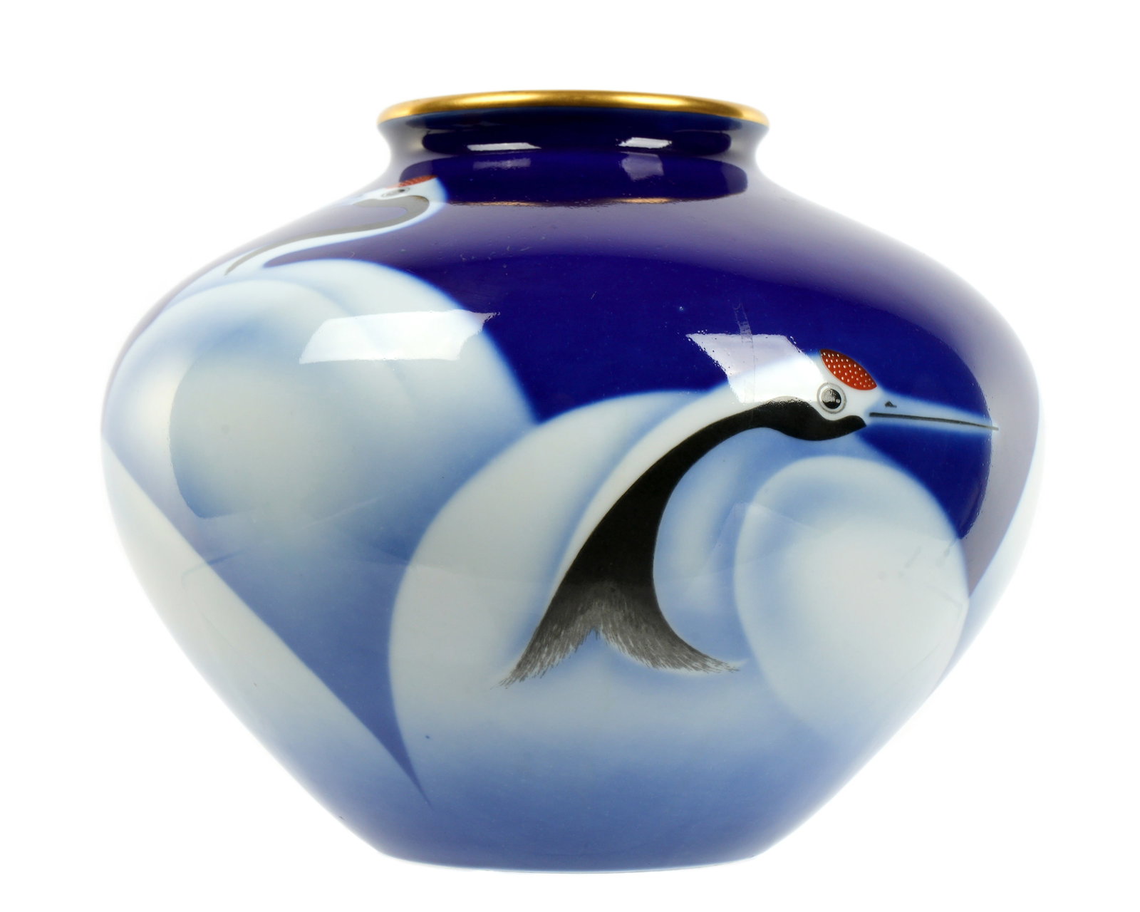 Antique Signed Japanese Fukagawa Porcelain Bird Vase: Squat form porcelain vase, cobalt blue ground, decorated with cranes or storks, well marked on base, overall 6.25" h. x 8" dia.