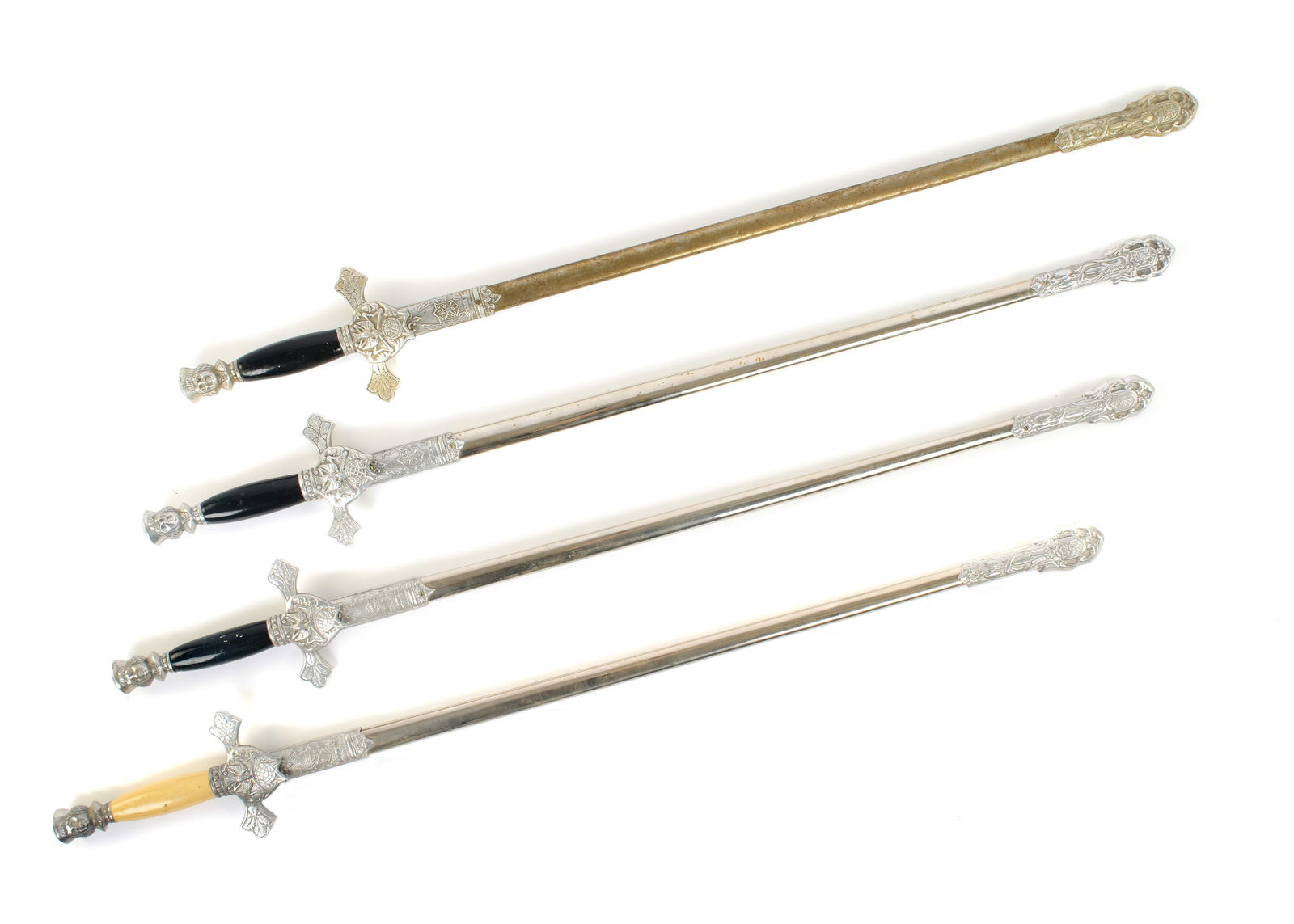 Four Knights of Columbus Fraternal Lodge Swords: Collection of four total, assorted makers and condition, three with plain blades, one with etched name, each overall 35" long in scabbards. Please see photographs for condition.