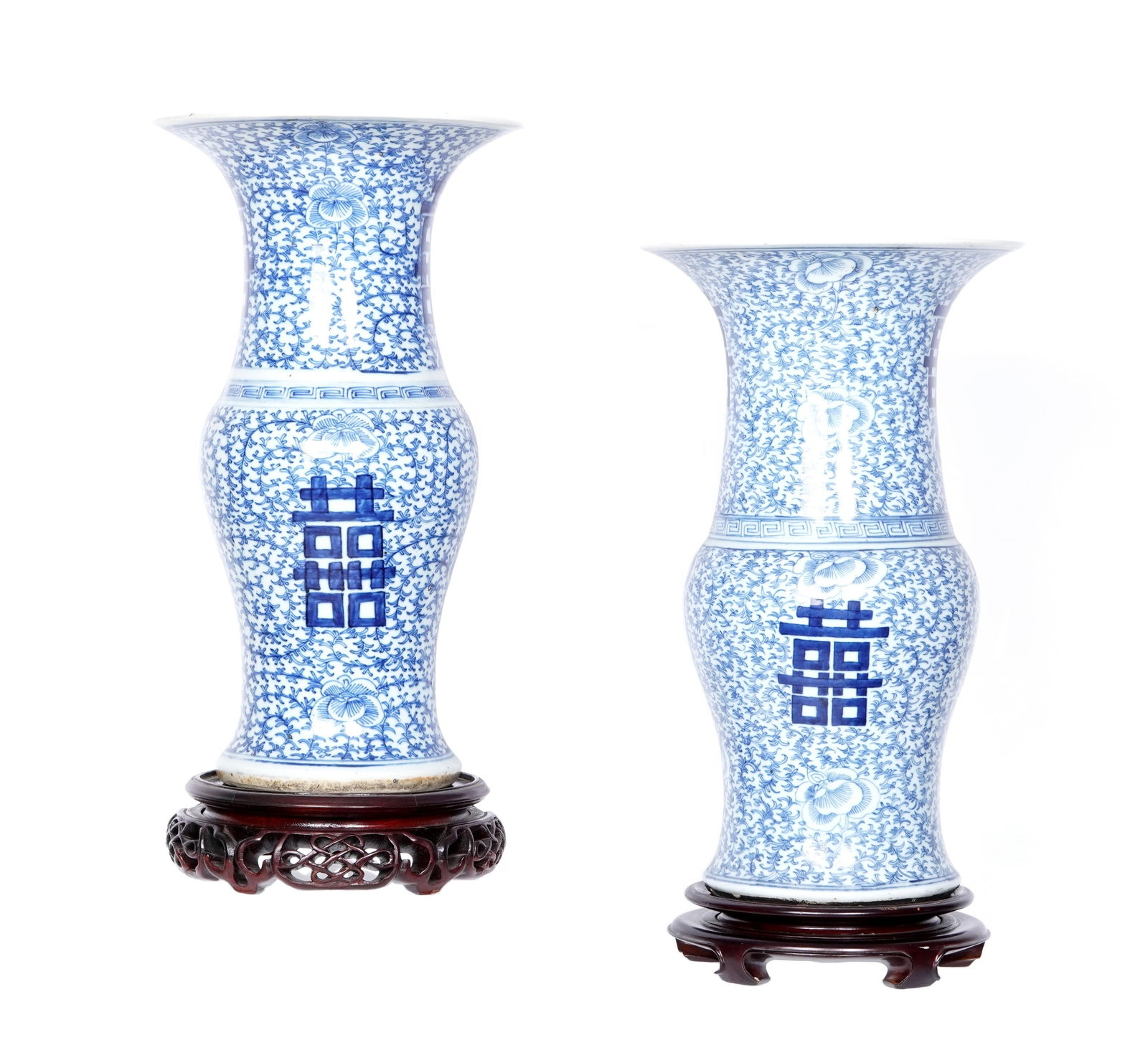 Pair Chinese Blue and White Decorated Vases: Pair baluster form porcelain vases with blue and white floral and foliate motifs, double happiness characters, each bearing a four character Chenghua mark. Overall 15.75" h. x 9.75". Sold with pair of