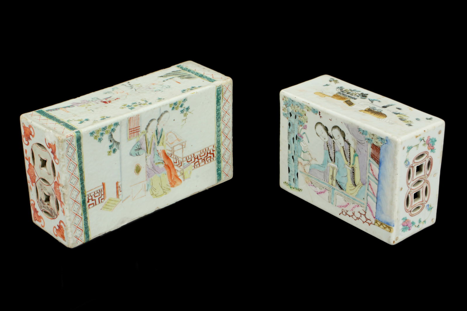 Two Antique Chinese Porcelain Pillows: Two pieces total to include 1) Famille Rose decorated with figures and landscape motifs, 9.25" h. x 5" x 3". 2) Famille Rose decorated with figures in genre scenes and interior scenes, 6.75" x 5" x 3"