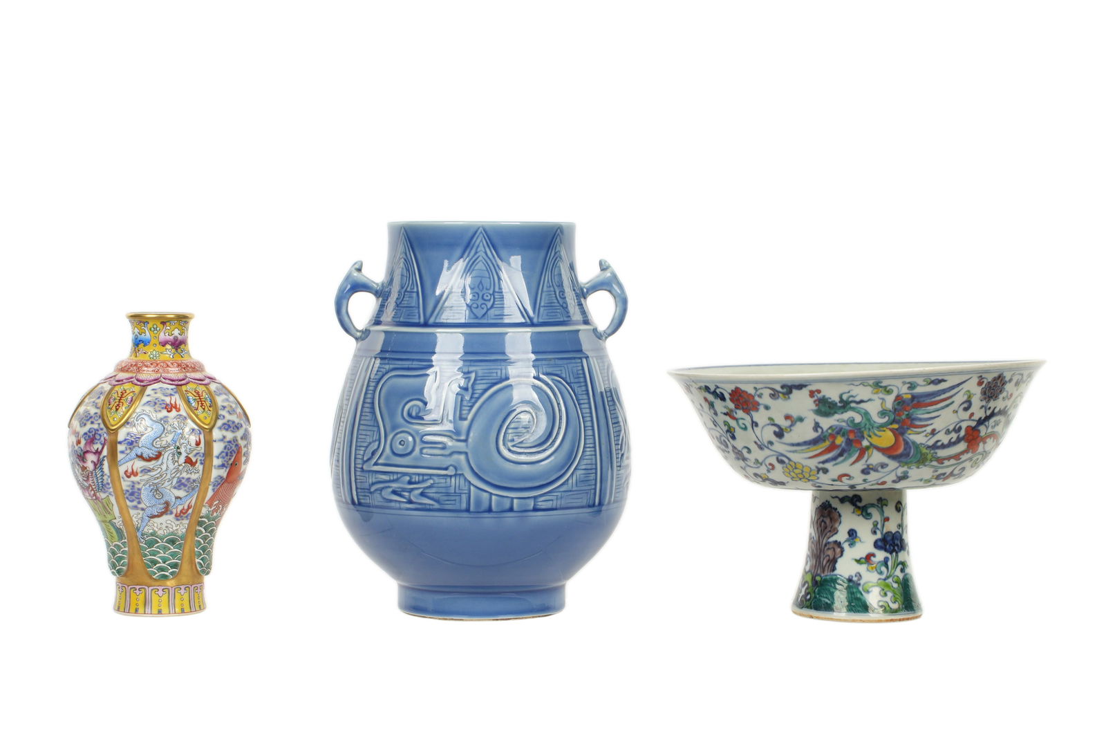 Three Piece Chinese Porcelain Collection Bowl and Two Vases: An assembled collection of three pieces total to include 1) Large old Chinese stem footed bowl, polychrome decorated with floral scroll and phoenix motifs, 6.75" h. x 1005". 2) Fine old Chinese dragon