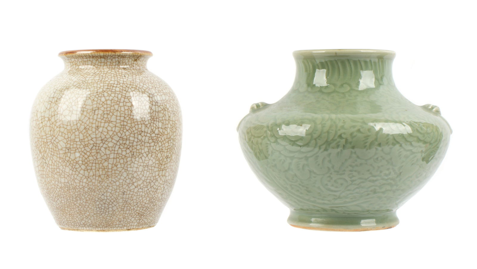 Two Antique Chinese Vases: One Crackle Glaze and measures 7.5" h. x 9", the other celadon peony design and measures 7.5" h. x 6". Both possibly Qing and drilled in the 1920's to be fitted as lamps