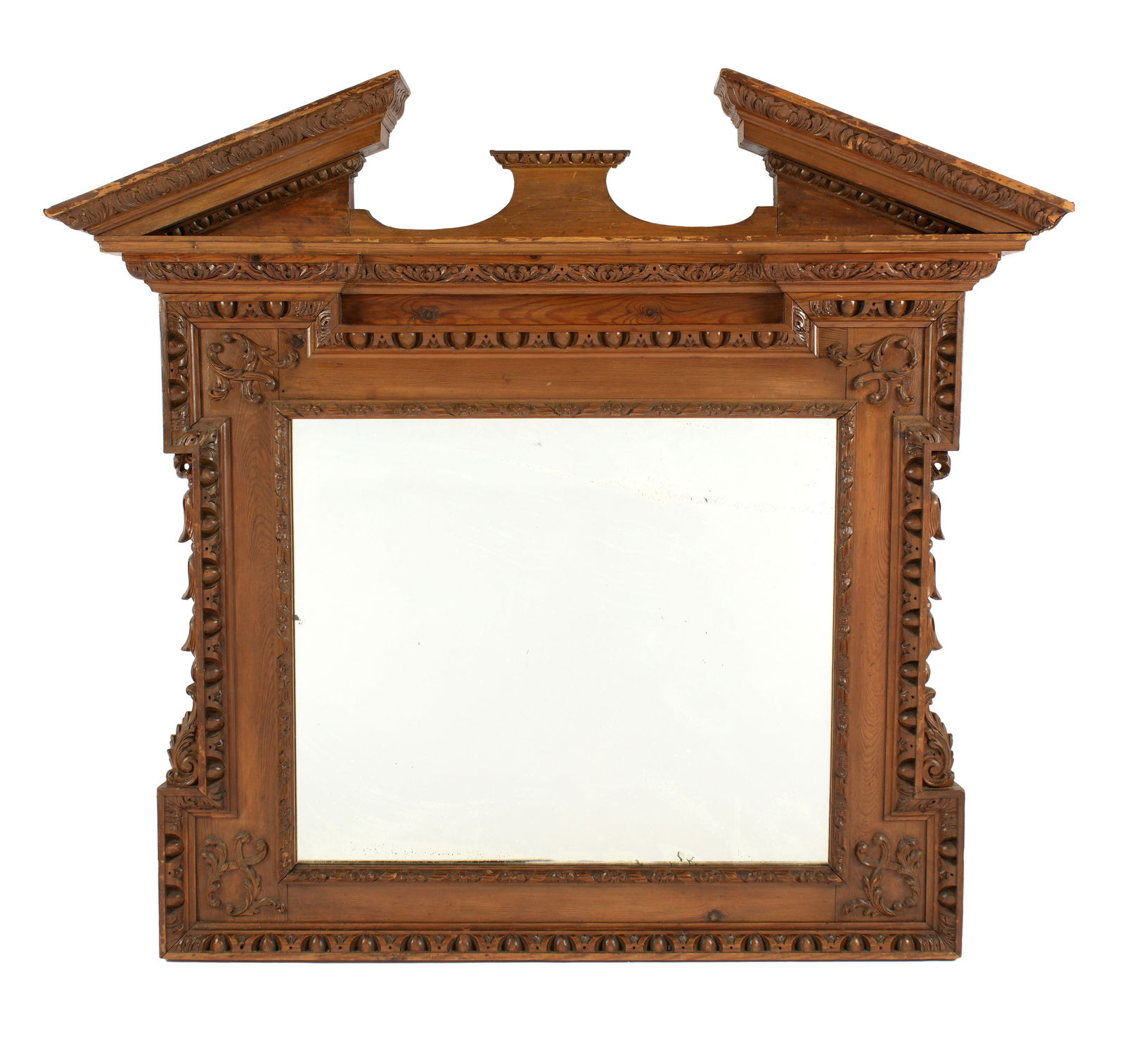 Manner of William Kent Georgian Carved Wood Mirror: Broken arch architectural crest with carved trim, shaped carved frame, applied decoration, rectangular mirror. Overall 47" h. x 51" x 6". From the recently closed Duck and Dolphin Antiques in Key West