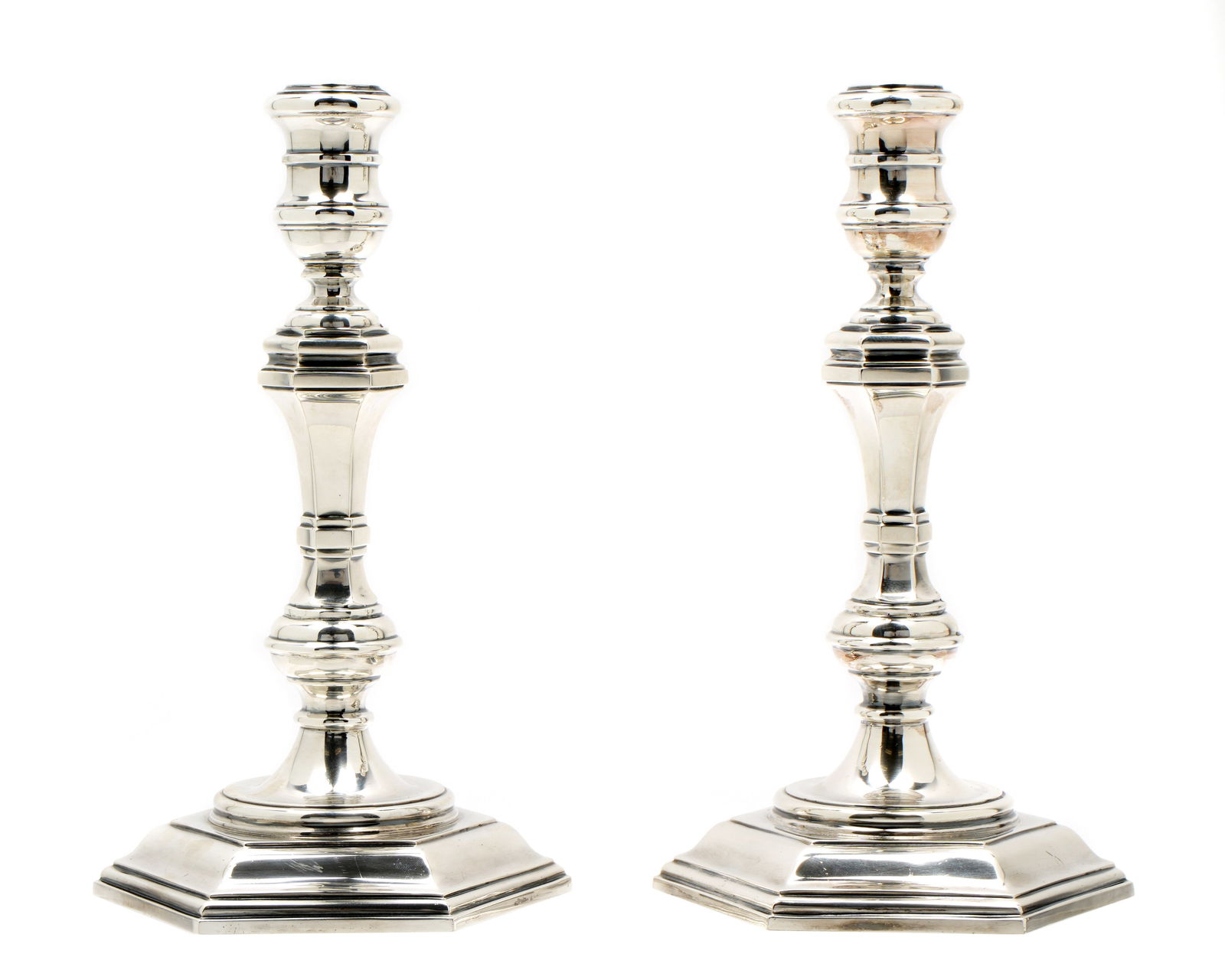 Pair Richard Comyns English Silver Candlesticks: Pair English sterling silver candlesticks, hallmarked under hexagonal foot Richard Comyns, London, 1976. Overall 10.25" h. x 5.5" base. Approx. 39.6 troy oz.