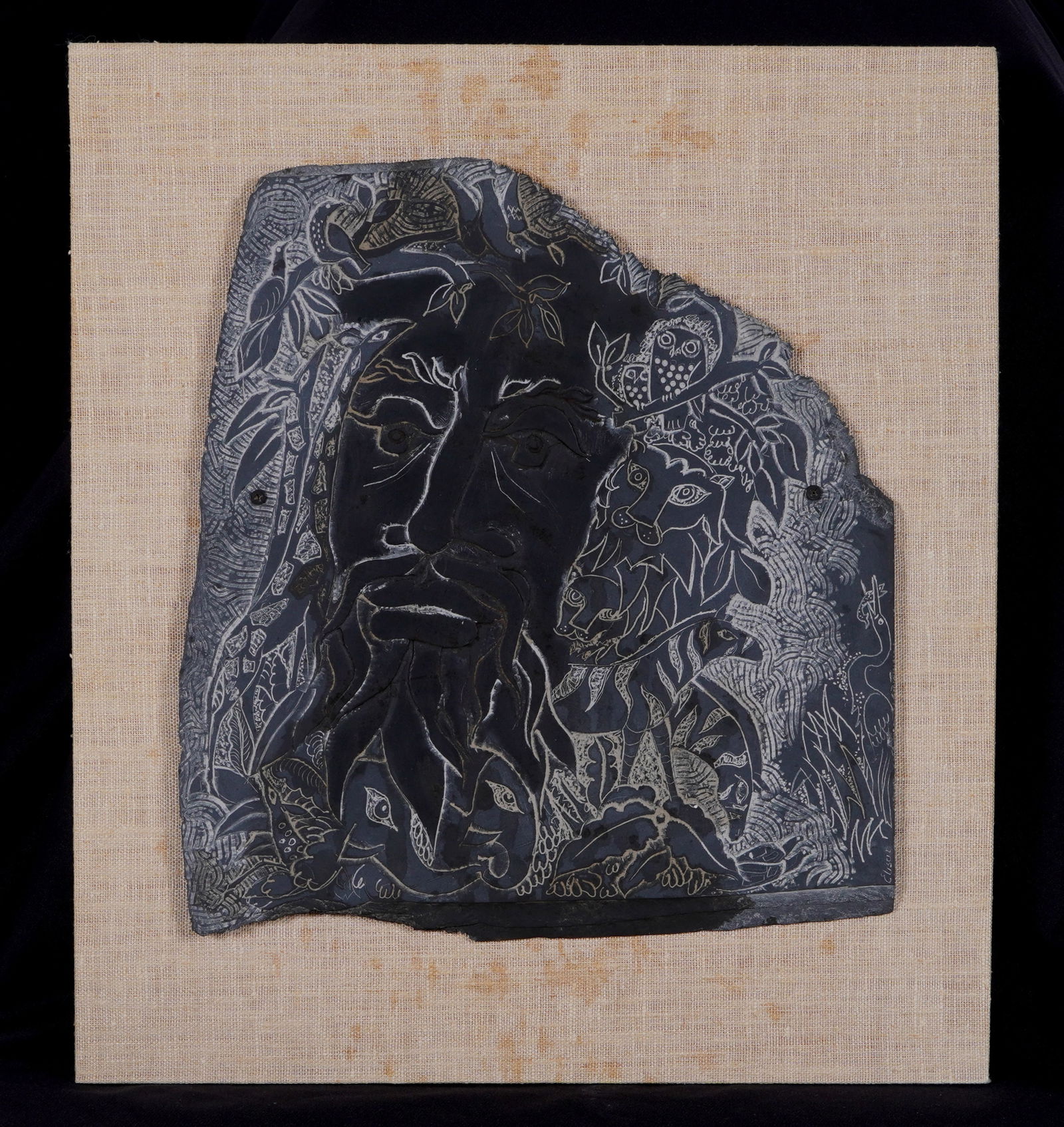 Frank Eliscu Carved Slate Bust of Man: ELISCU, Frank, (American, 1912-1996): Relief and incised carved slate bust of a man in foliate ground, incised signature lower right, 13.75" x 12.5", screw mounted to board 18" x 16". Eliscu is most f