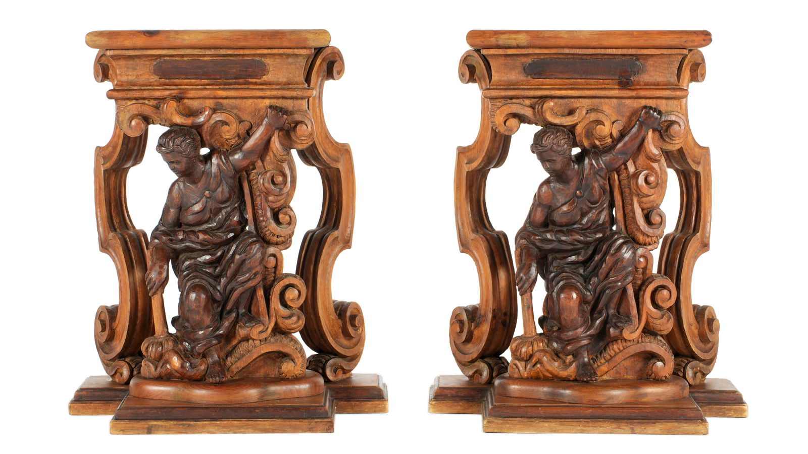 Pair Italian Carved Figural Console Tables: Each with scroll carved top over figural maiden and scroll supports, shaped base. Originally sold as a dining table, sold with carved and turned stretcher bar. Previous owners used as console table. E