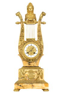 French Bronze and Siena Marble Lyre Mantle Clock: Lyre form mantle clock, bronze figural maiden bust finial, Siena marble case with applied bronze accents and decoration to include angles, urn, and foliate scroll. Stepped base, on four bronze feet. U