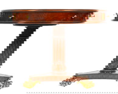 Maitland-Smith Leather Top Drum Table: Mahogany drum table by Maitland-Smith, embossed leather top, false drawer panels and gilt metal medallions on skirt. Fluted column support, acanthus leaf decoration at splayed base. Brass paw feet on