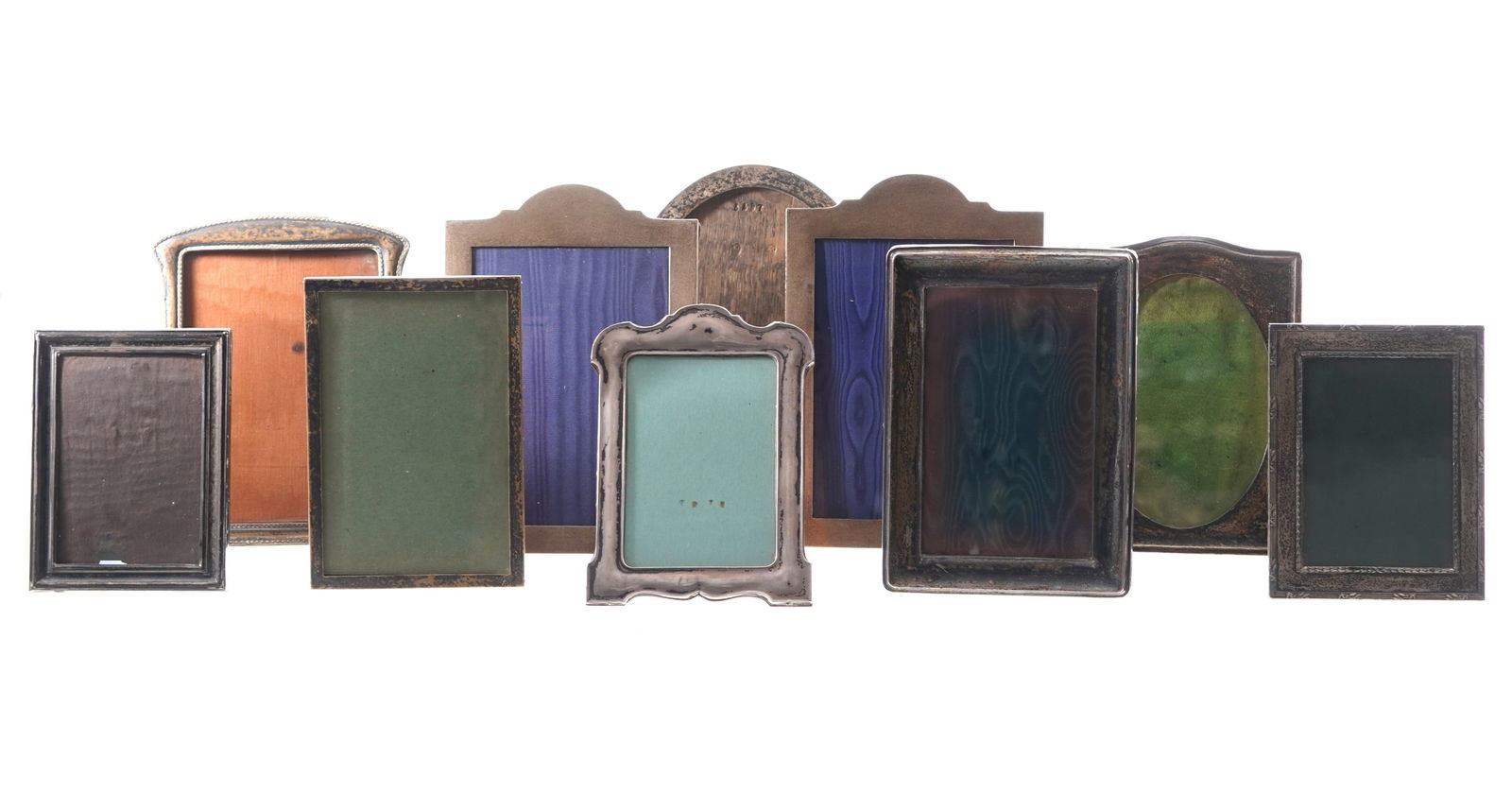 Collection of 10 English Sterling Silver Frames: An assembled collection of 10 late 19th / early 20th Century sterling silver table top picture frames. Assorted makers to include Hirons, Plante & Co.; Cohen & Collins; Hasset & Harper Ltd; and others