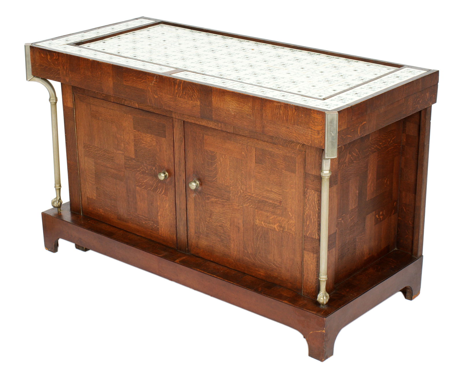French Tile Top Parquetry Bar: Mid 20th Century, repeating tile top, oak parquetry case, silvered shaped supports at both front corners. Two doors open to interior shelves. Overall: 35" h. x 56" x 26.5". Condition: Wear and dings t