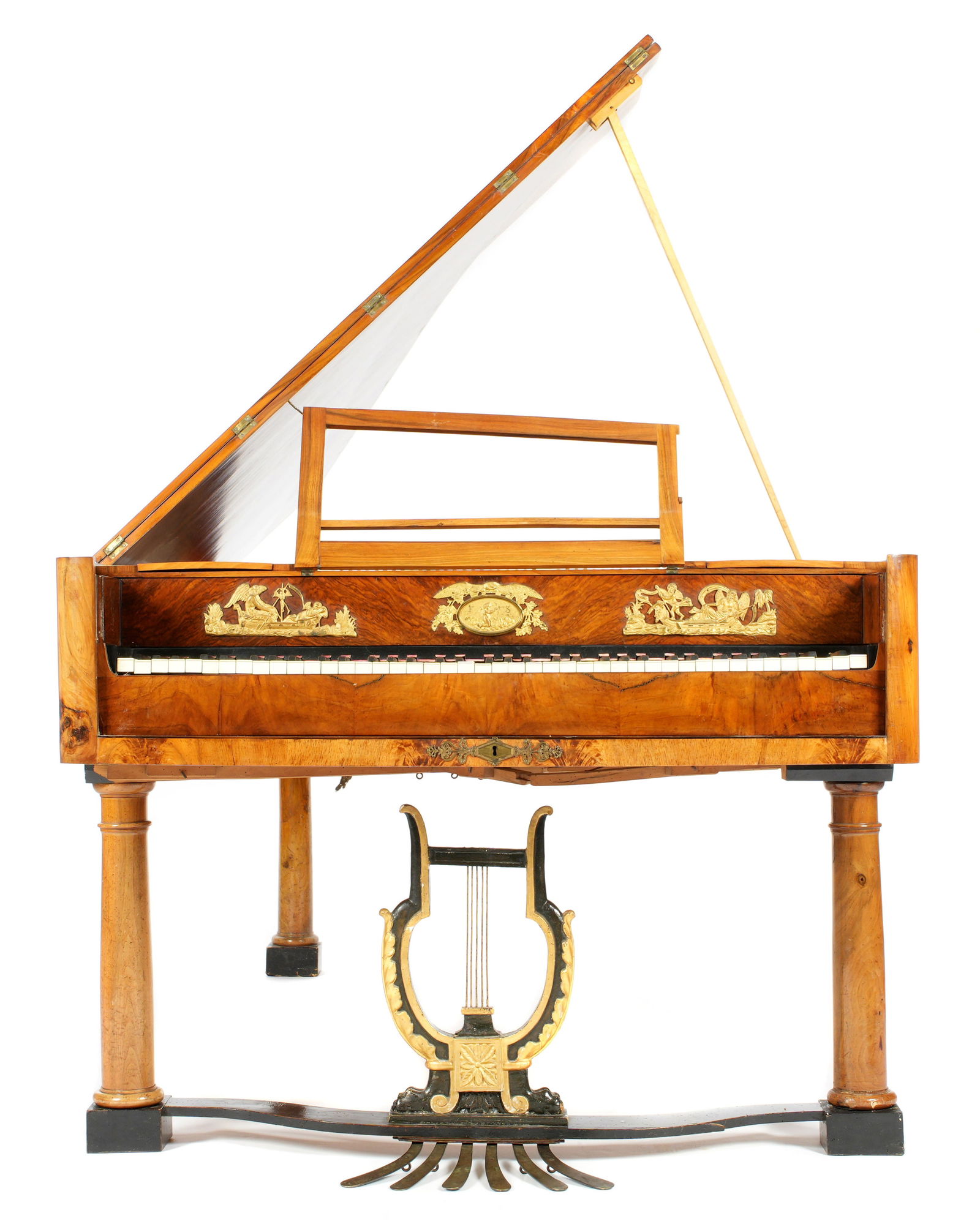 Early 19th Century German Ferdinand Sailer Pianoforte: Circa 1800-1825 by Ferdinand Sailor (Seiler), Munich. Veneered case with applied ormolu plaques, bone and ivory keys. Six pedals on lyre form parcel gilt support, additional internal bells. Turned col