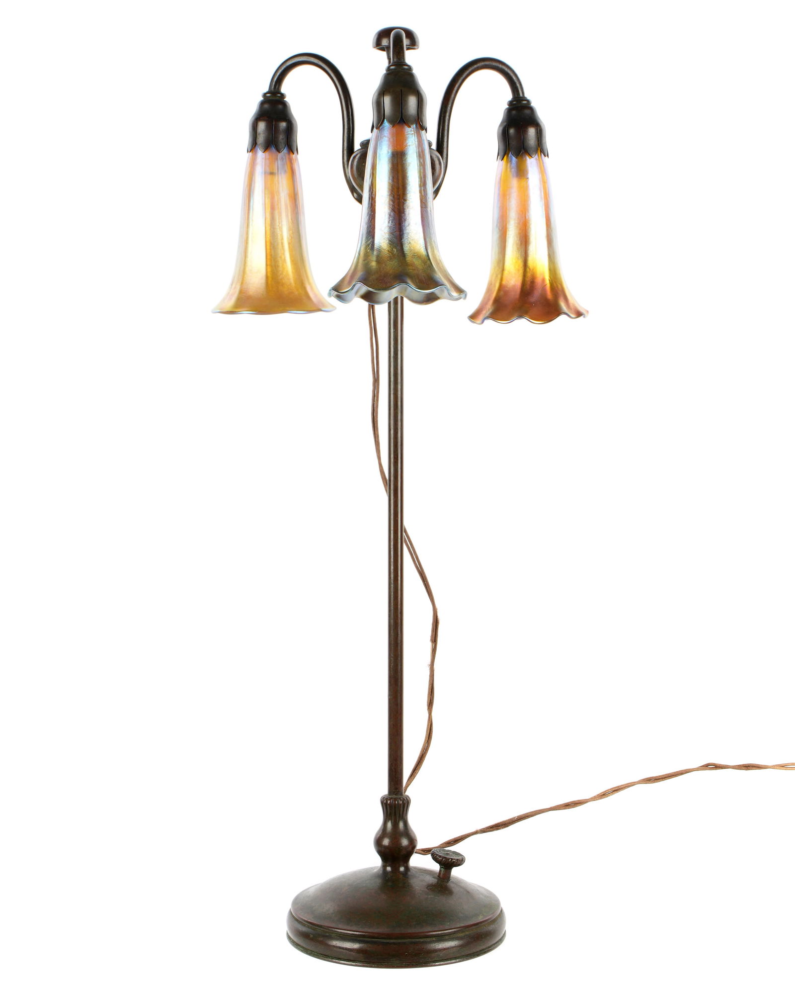Tiffany Studios Bronze Three Light Lily Lamp 28593: Patinated bronze three light lamp with adjustable standard, arched arms, urn finial, domed base. Marked "Tiffany Studios, New York, 28593", and the Tiffany Studios monogram. Overall 21" h. x 5" base d