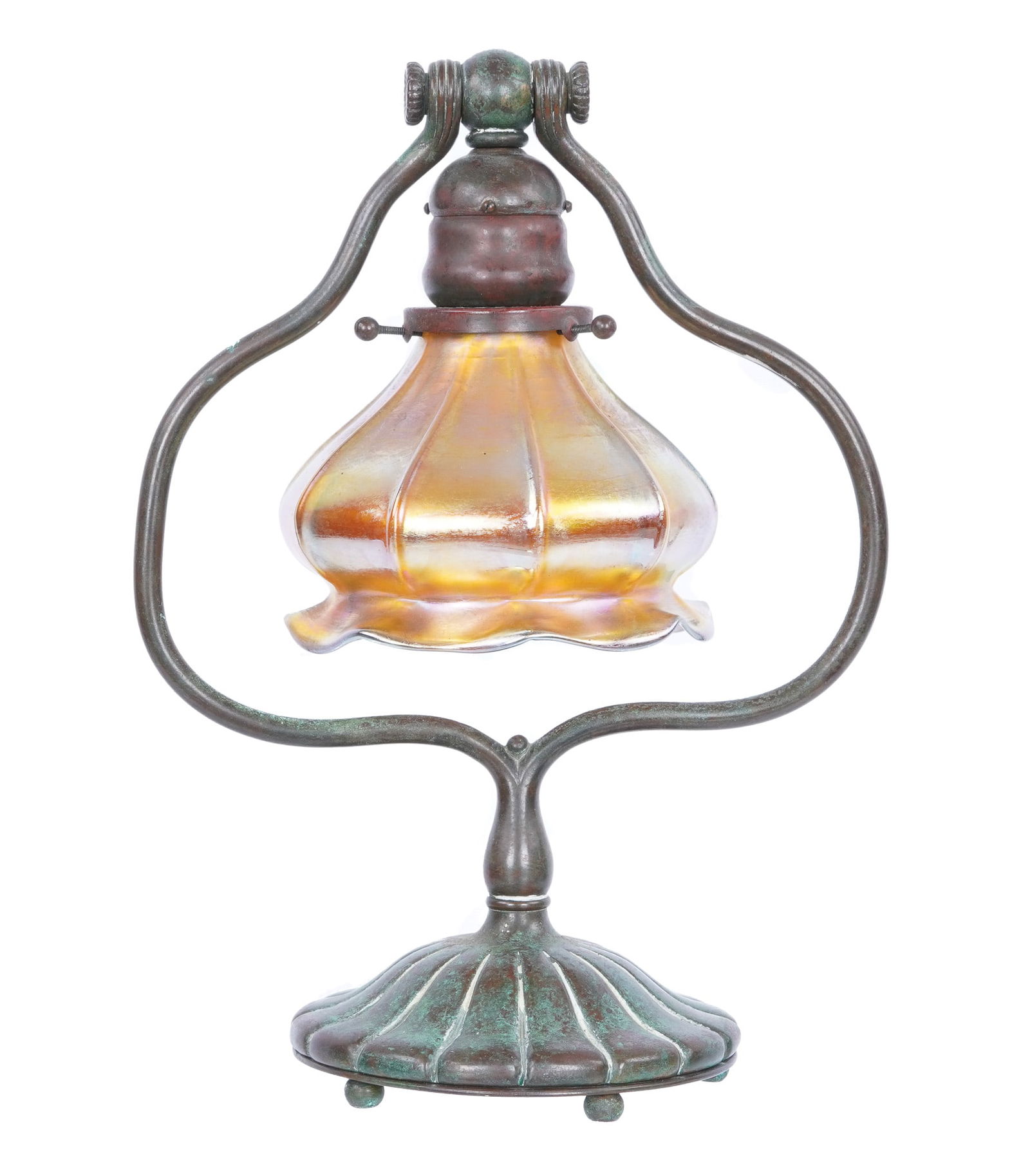 Tiffany Studios Bronze Harp Desk Lamp 419: Patinated bronze harp lamp, single socket fixture, marked "Tiffany Studios, New York, 419" on base. Overall 13" h. x 9.5" x 5.5". Sold with unmarked replacement iridescent art glass shade. 4.25" h. x